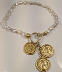Short Necklace of White River Pearls with Central Hoop and Trio of Coins
