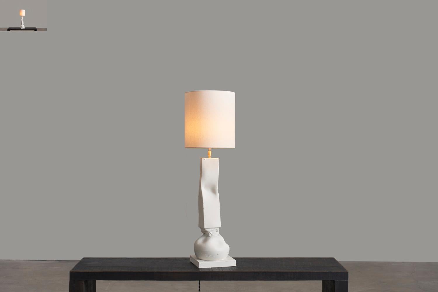 Short Nove and Crespano Table Lamp by Jenna Basso Pietrobon
Dimensions: W 17 x D 17 x H 79 cm
Materials: Ceramic.
Weight: 3 Kg.

Jenna Basso Pietrobon, born in 1986, is an artist whose work delves into societal issues through the lens of her