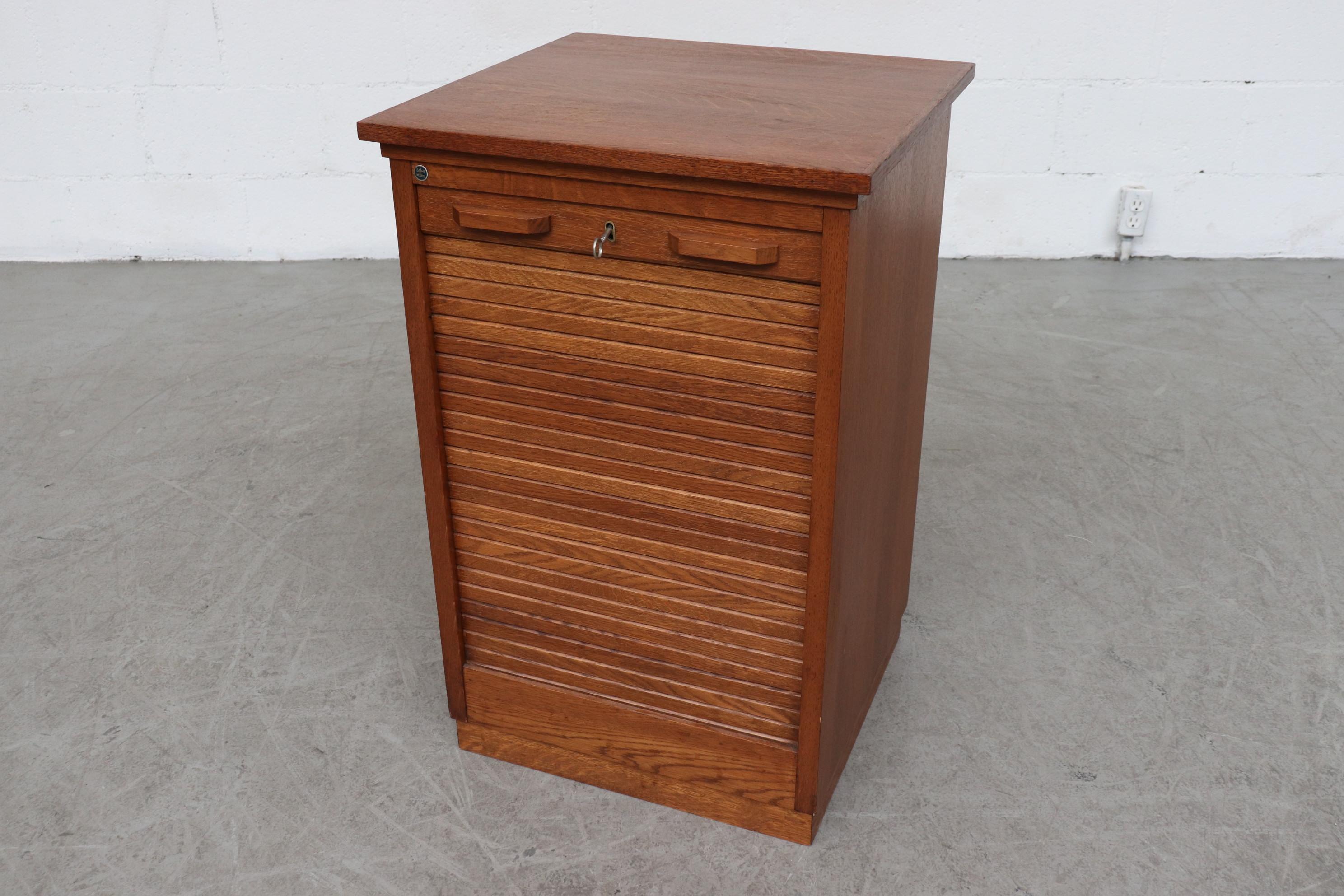 Short Oak File Cabinet by Eeka with Tambourd Door In Good Condition In Los Angeles, CA