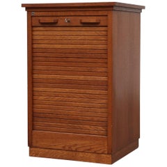 Short Oak File Cabinet by Eeka avec porte Tambourd