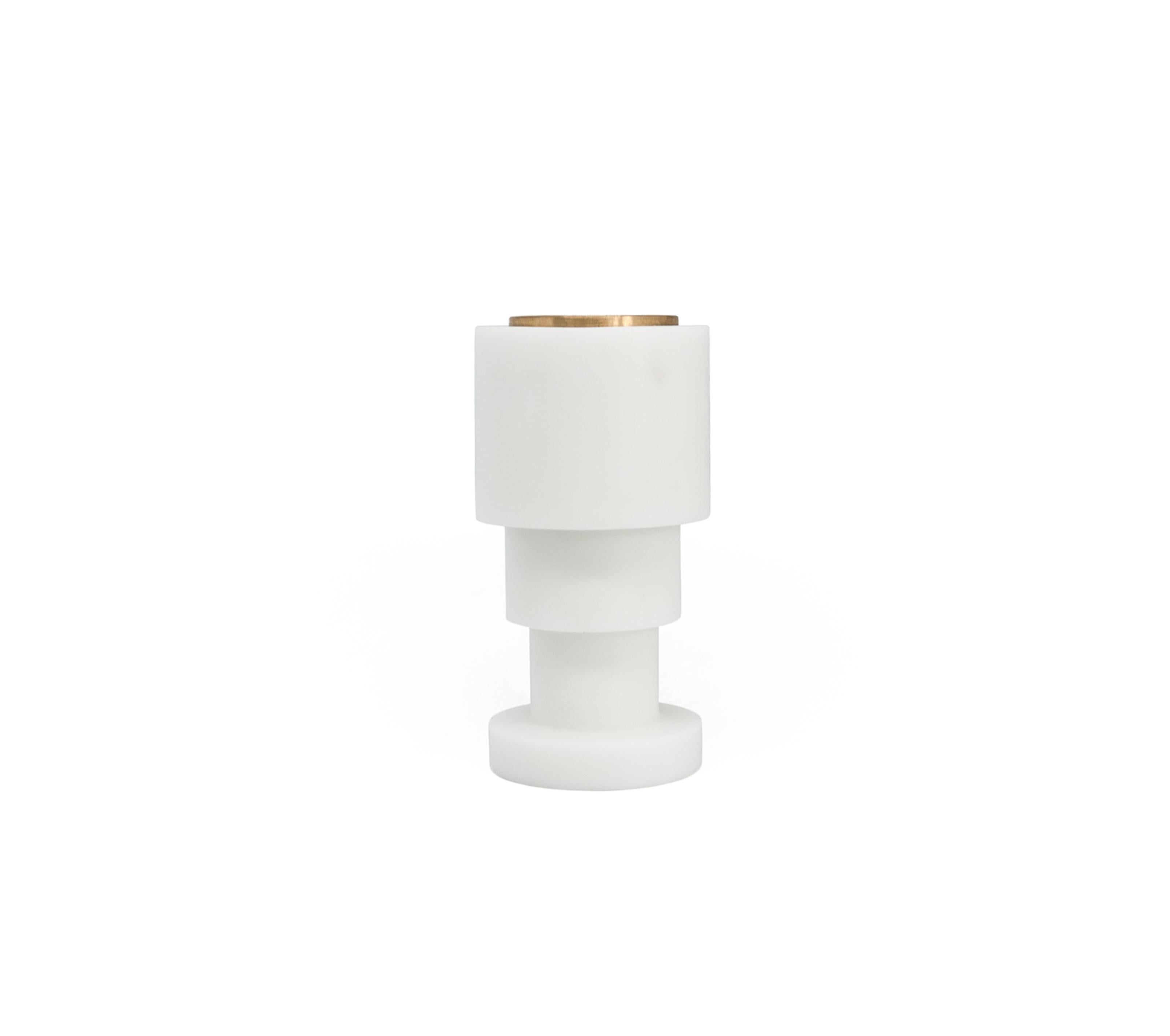 Short squared unicolor candleholder in white Carrara marble and brass.
-Jacopo Simonetti Design for FiammettaV-
Each piece is in a way unique (every marble block is different in veins and shades) and handmade by Italian artisans specialized over