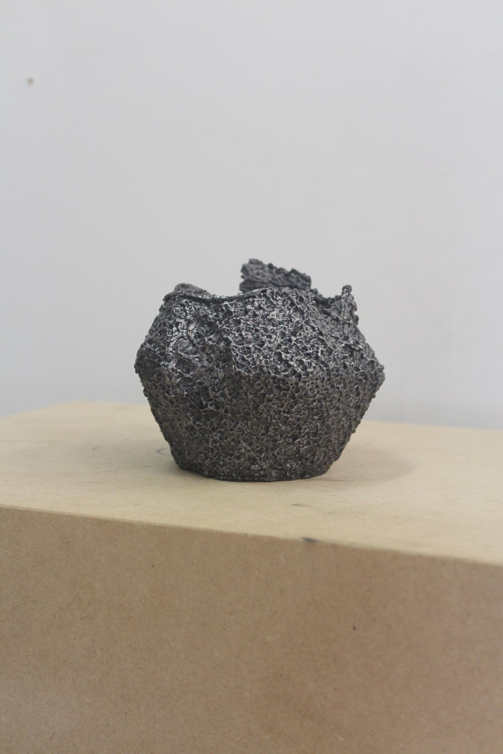Short Vessel Small by Saturday Yard Work
Dimensions: W 13 x D 13 x H 11 cm
Materials: Aluminium.
Finish: Blackened texture. 

SATURDAY YARD WORK by Nathan Martin is a Kaurna/Adelaide based practice that aims to find a medium between sculpture,