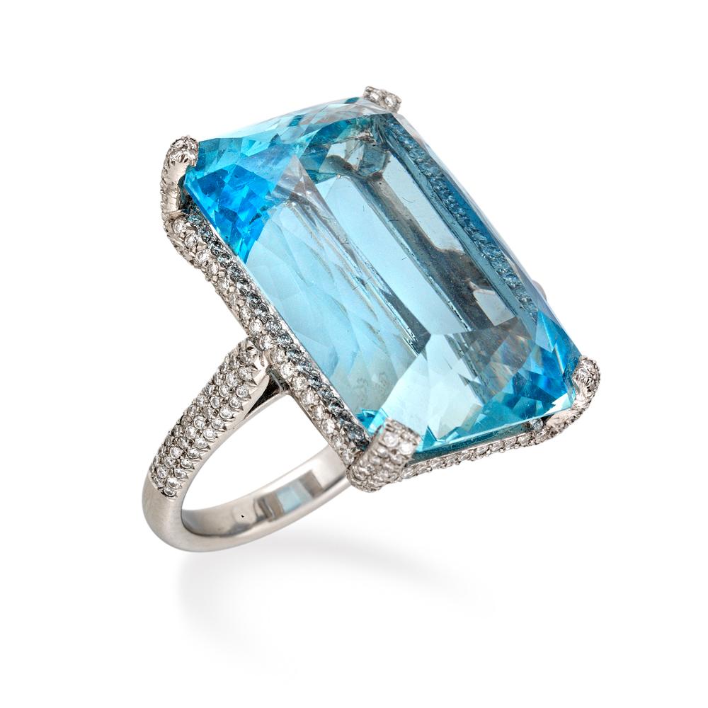 A large aquamarine and diamond ring, the rectangular radiant-cut aquamarine weighing 43.10 carats, four claw-set to a brilliant-cut diamond-encrusted collet and shoulders, with D-section platinum shank, hallmarked platinum, London 2008, bearing the