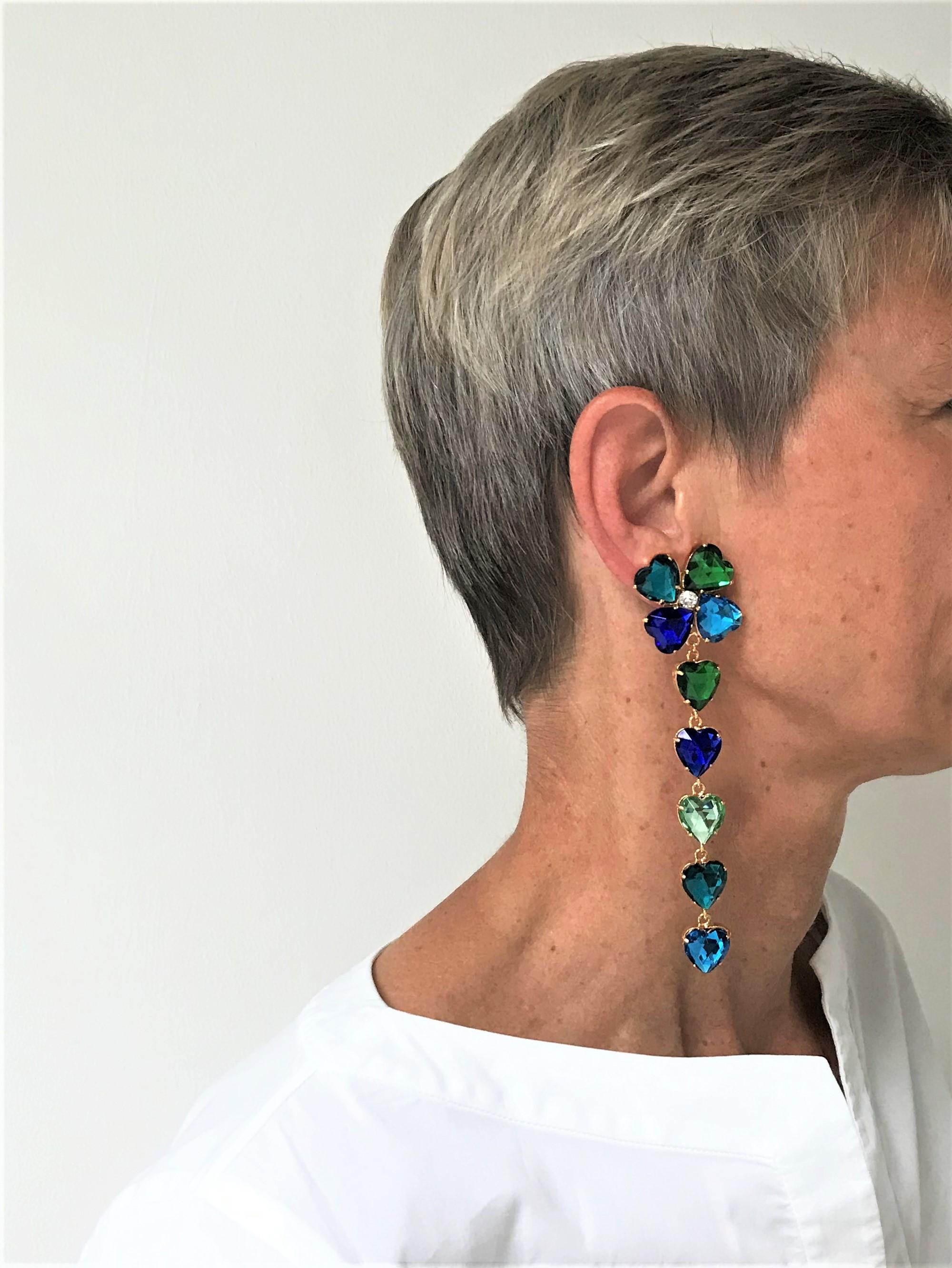 SHOULDER - CLUSTER CLIP-ON EARRINGS ARE VERY TRENDING!
Gorgeous YSL ear clips made from 5 different colored cut rhinestone hearts.  4 hearts in different colors make a shamrock at the top. The remaining 5 hearts hang loosely on the clover leaf and