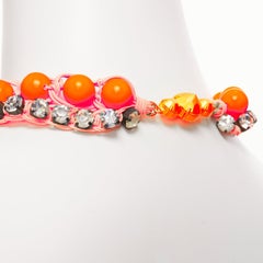 Shourouk, collana girocollo in corda con perline di cristallo chiaro arancione neon