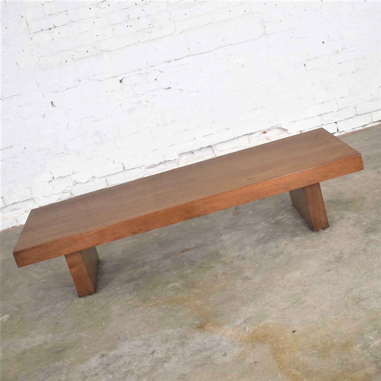 Handsome Mid-Century Modern or Asian style low coffee table, cocktail table, bench, or Teahouse Table, as it is titled on its label along with Show-Pieces which we assume is the maker or brand. Solidly constructed of wood with walnut veneer. It is