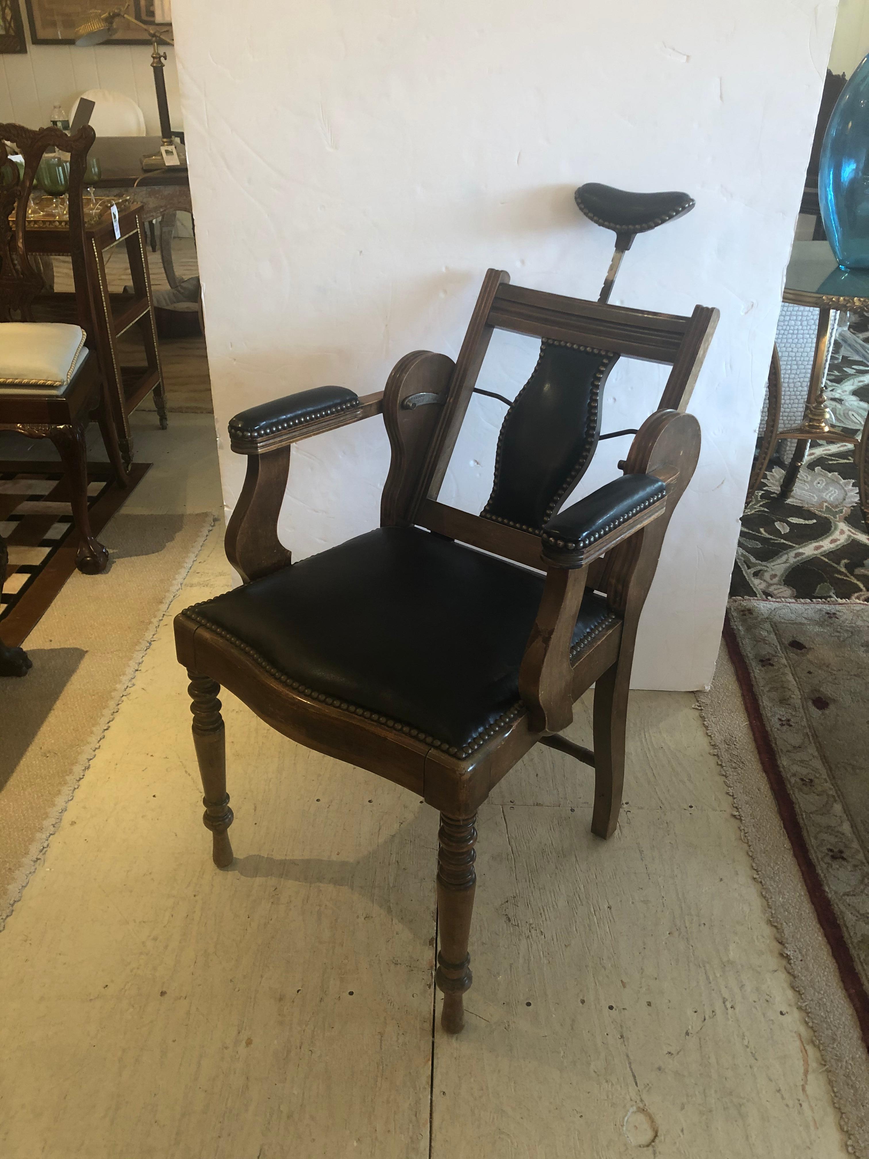 A sensationally designed 19th century dentist chair that will steal the show in any room. Mahogany and black leather with studs, it reclines and has curved head rest. Looks great as a handsome desk chair.
Patent # 22608.