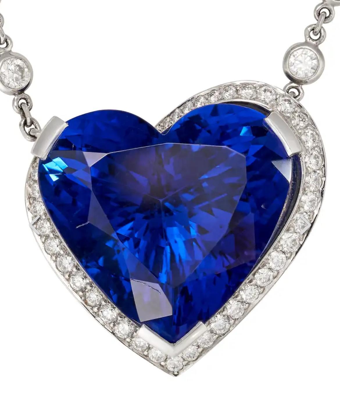 Description
A BEAUTIFUL BOODLES, A TANZANITE AND DIAMOND PENDANT NECKLACE in platinum, set with a heart shaped tanzanite of 31.9 carats in a stylised heart shaped setting pave set with round brilliant cut diamonds, suspended from a chain accented