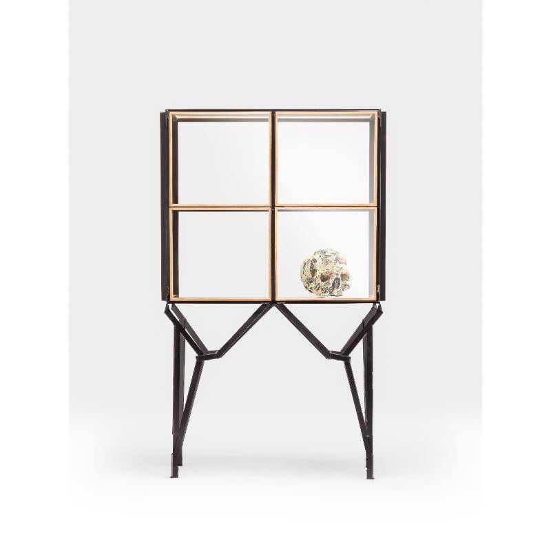 Showcase cabinet, 2x2 by Paul Heijnen (2011)
Dimensions: H131 x L80 x W50 cm
Materials: Steel, oak, glass.

Available in different varieties/stains,

Each cabinet is made to order and as such Size, colour & materials are fully customisable;