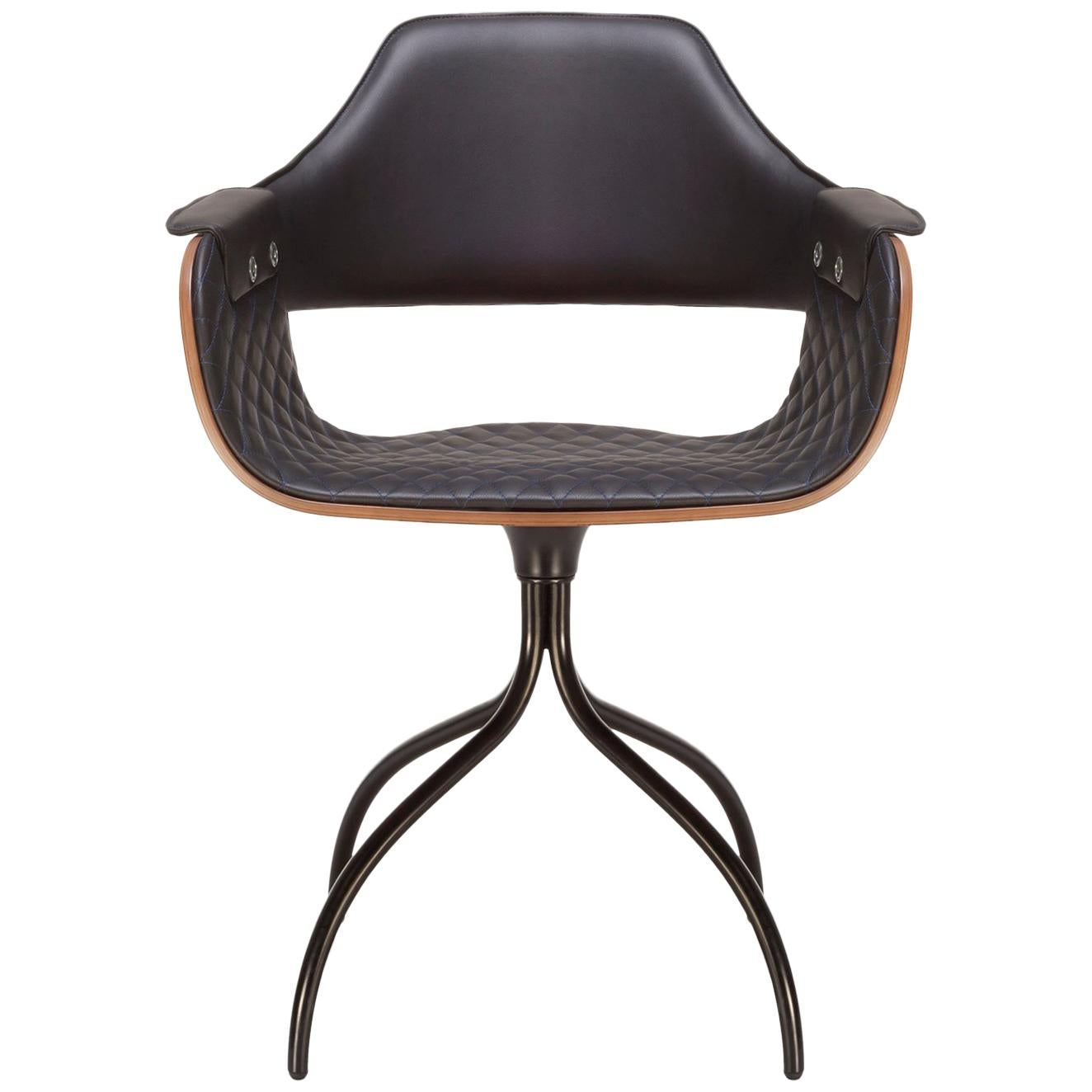 Swivel walnut chair upholstered in black leather 