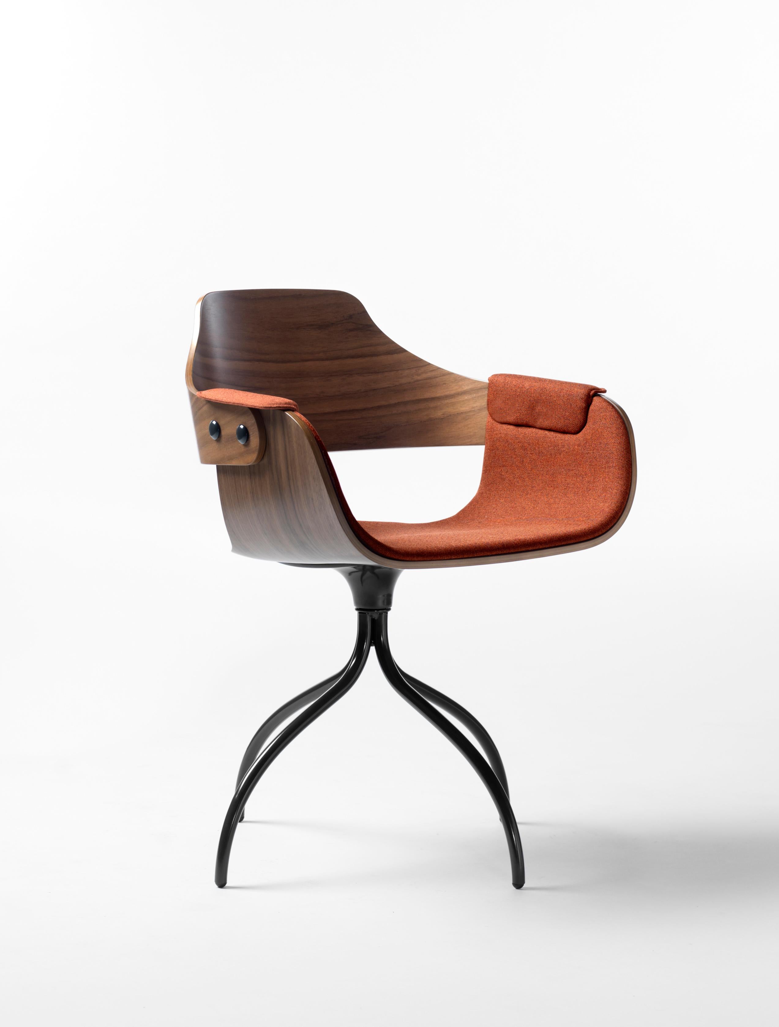Modern Upholstered swivel chair in walnut designed by Jaime Hayon