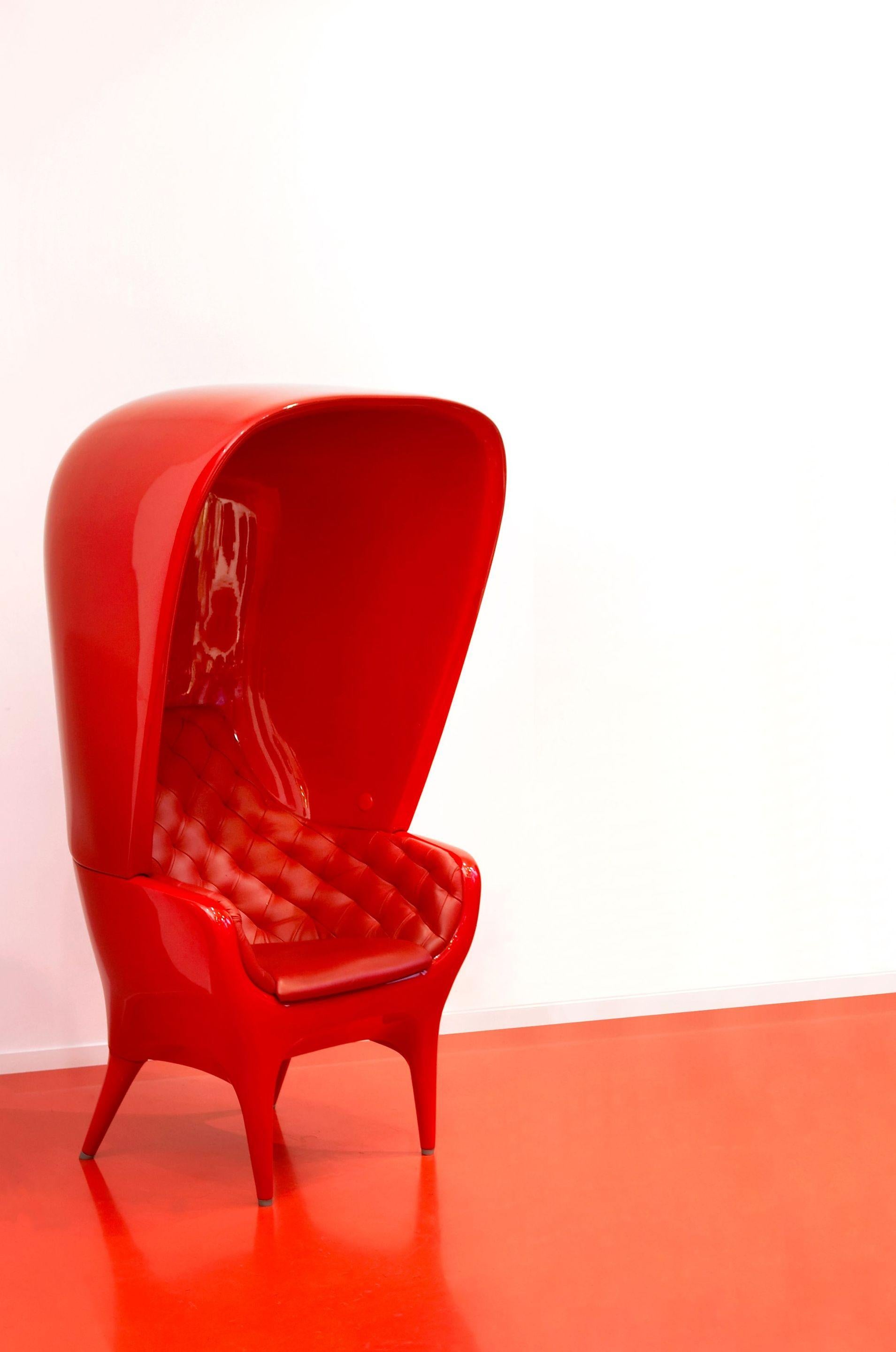 Showtime red armchair with cover
Dimensions: D 82 x W 90 x H 168 cm 
Materials: cover in rotomoulded polyethylene. Upholstered in leather capitoné and bright lacquered.
Available upholstered in different fabrics, lacquered in black or white, and
