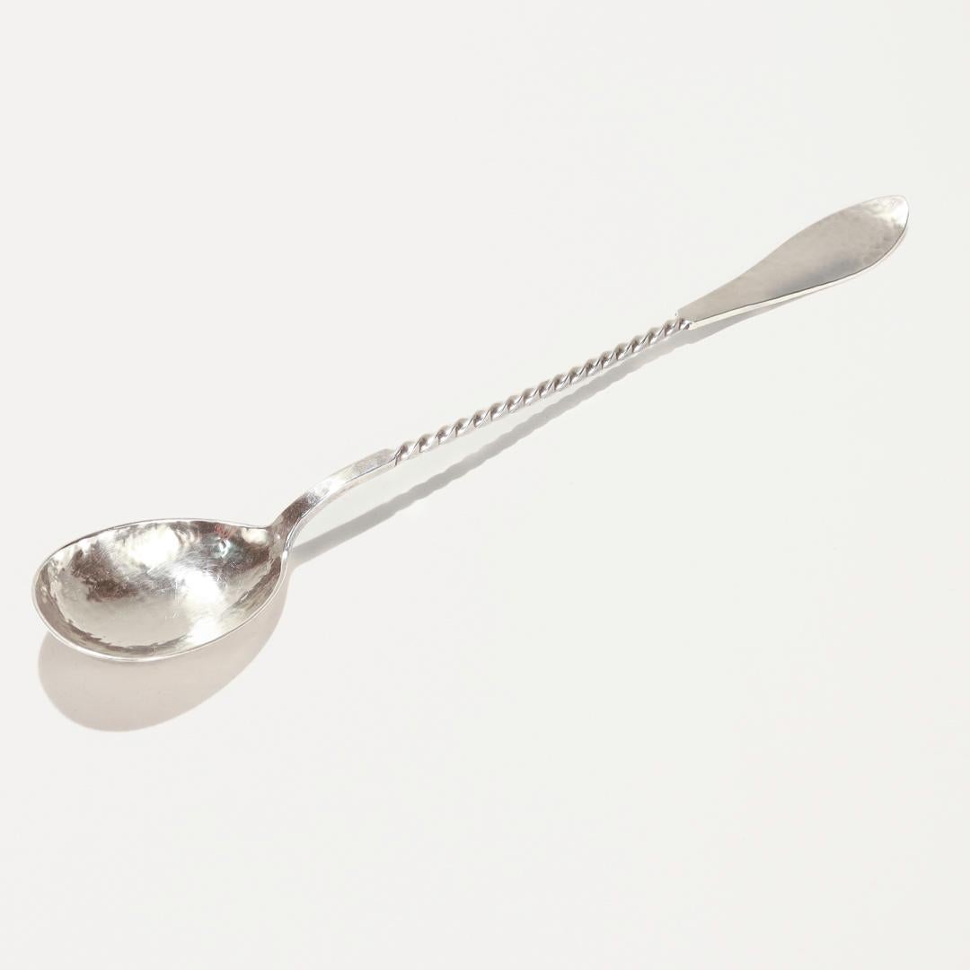 A fine cocktail spoon or stirrer.

By Shreve & Co. of San Francisco, California.

In sterling silver.

Wiith an elongagted twist handle and hand hammering throughout.

Hallmarked to the reverse.

Simply a hand hammered cocktail spoon!

Date:
Early