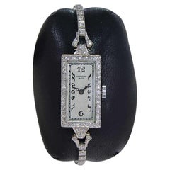 Shreve & Co., 18 carats Montre Art déco bicolore pour femme avec lunette en diamants des années 1920