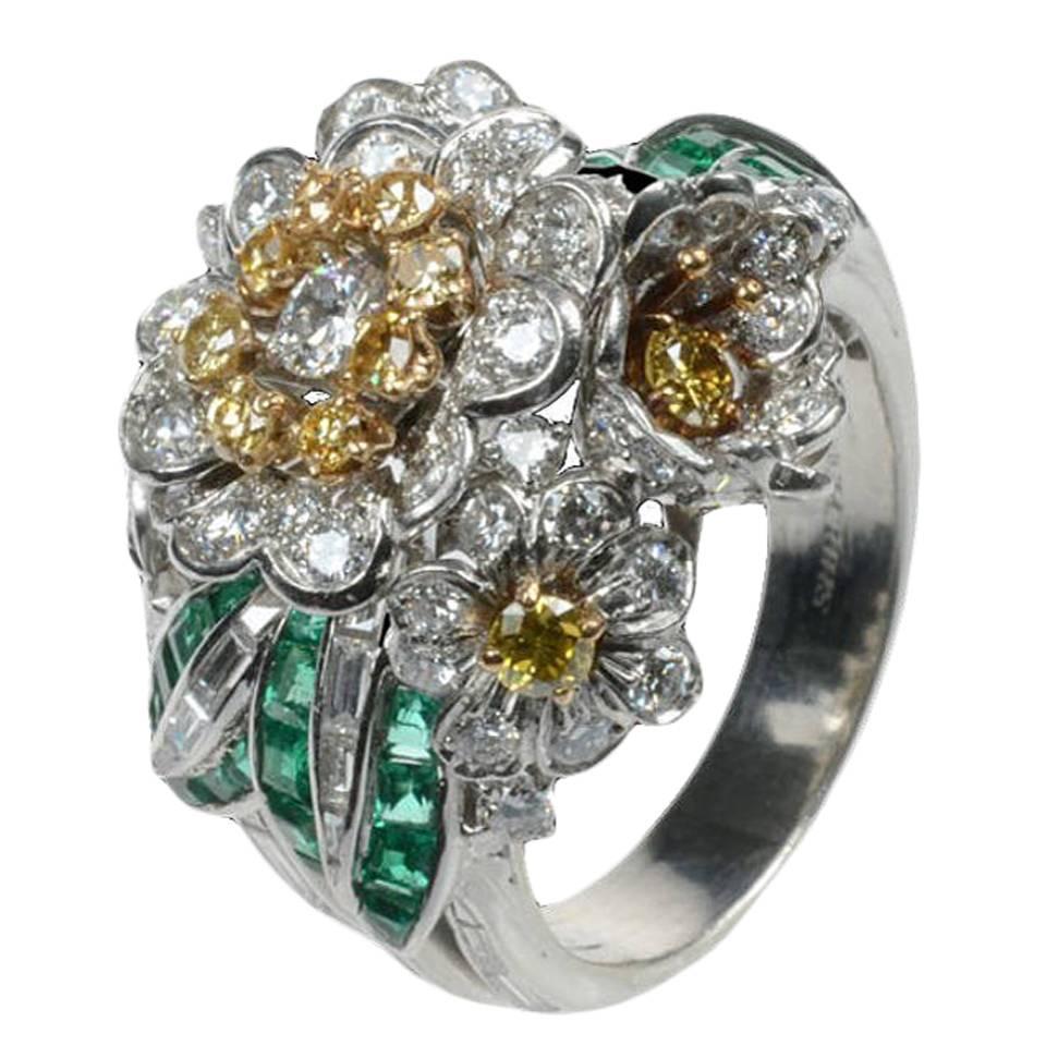 60 round-cut diamonds1.25ct approx
13 round-cut fancy yellow diamonds 0.65 approx
23 baguette-cut diamonds 1.00ct approx
28 calibré-cut emeralds 0.75ct approx
Platinum and yellow gold
O 1/2 UK, 7 1/2 USA, can be adjusted to your own finger size


A