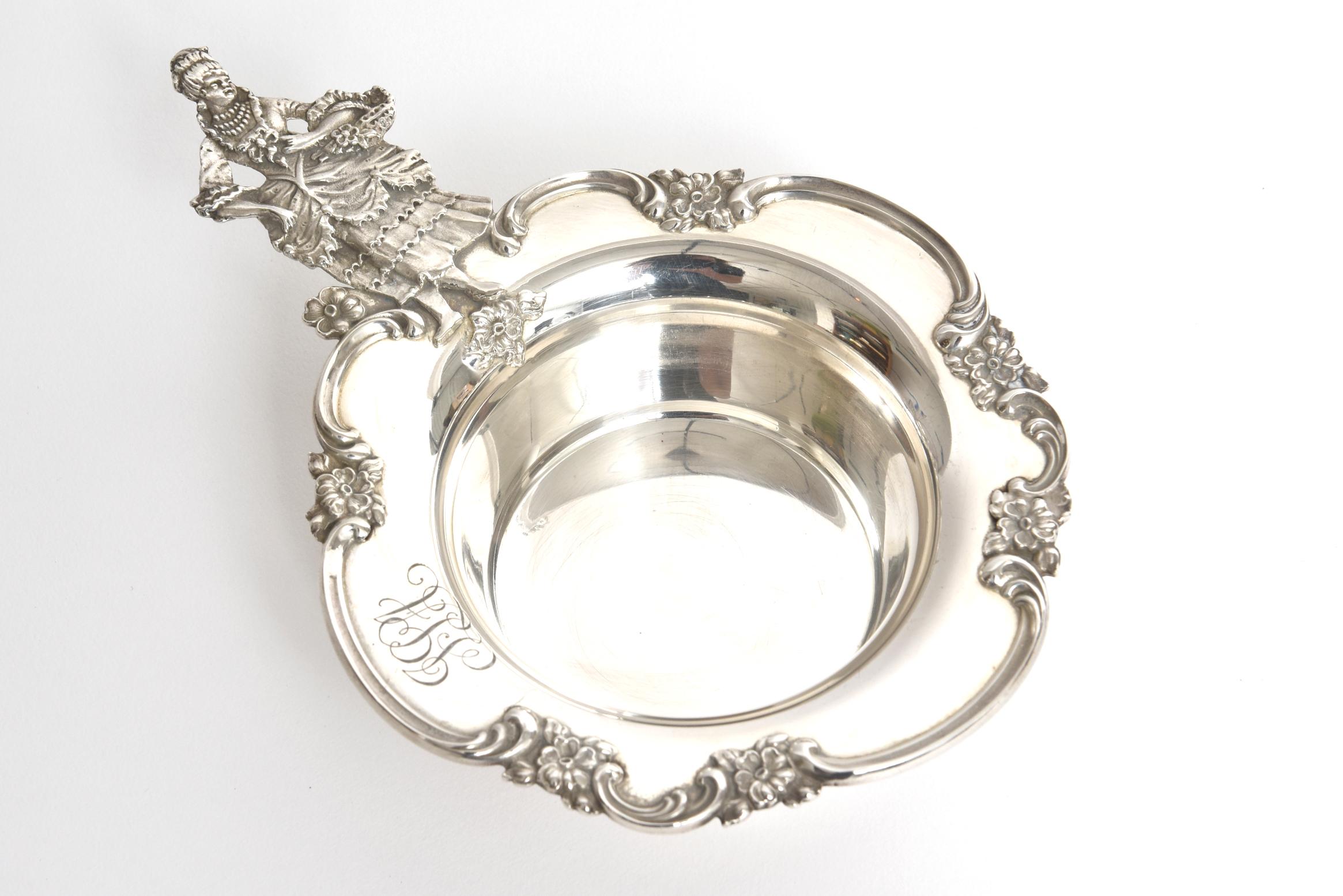 Handled, monogrammed, stamped Shreve & Co., San Francisco,

These beautiful ramekins include 6 that feature a man in period costume holding a cane. The other 6 feature a woman in period costume with a triple strand of pearls holding a basket for