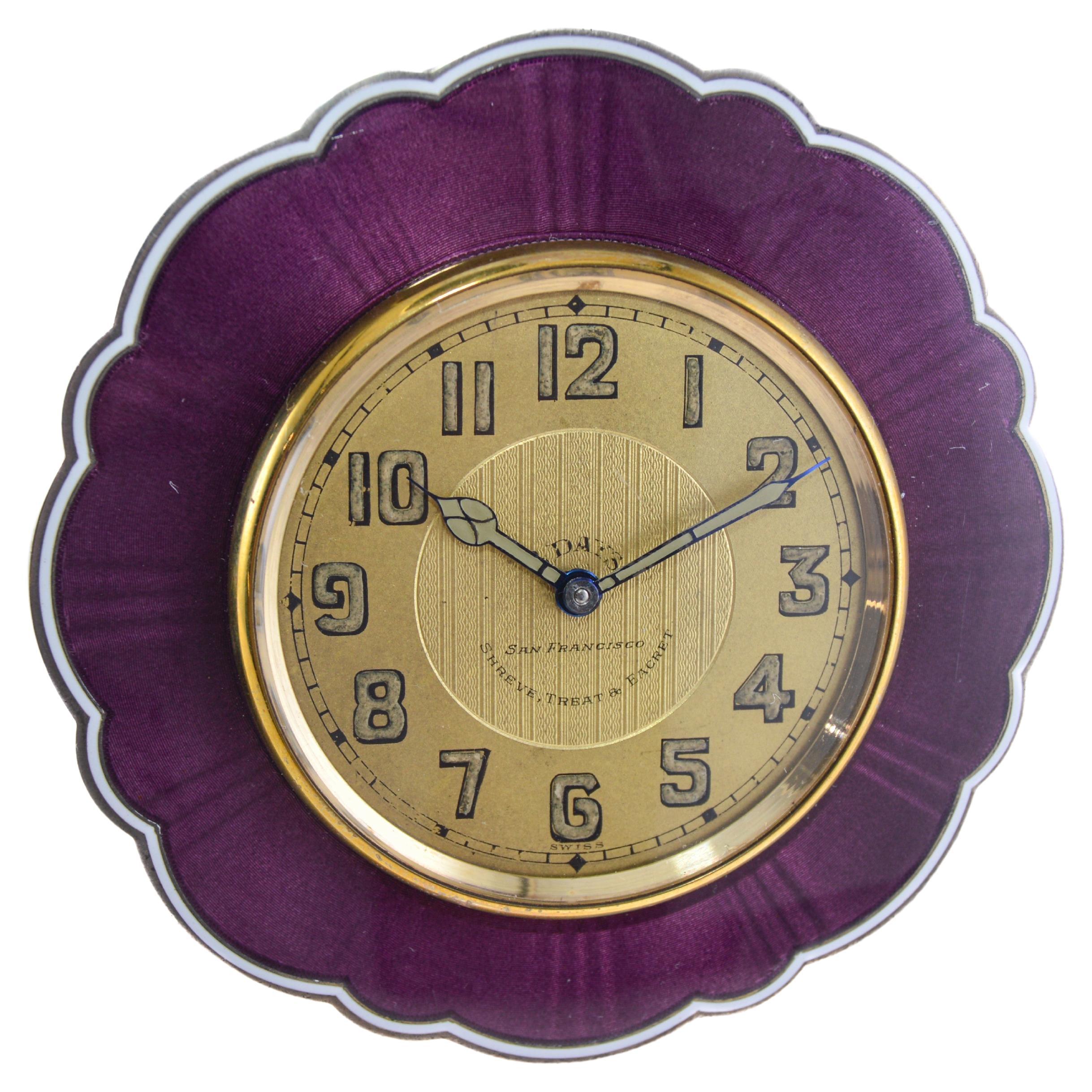 FACTORY / HOUSE: Shreve & Co.
STYLE / REFERENCE: Art Deco Desk Clock
METAL / MATERIAL: Sterling Silver & Bronze / Kiln Fired Enamel
CIRCA / YEAR: 1920's
DIMENSIONS: 4 Inches X 4 Inches 
MOVEMENT / CALIBER: High Grade 8 Days
DIAL / HANDS: Gilt with