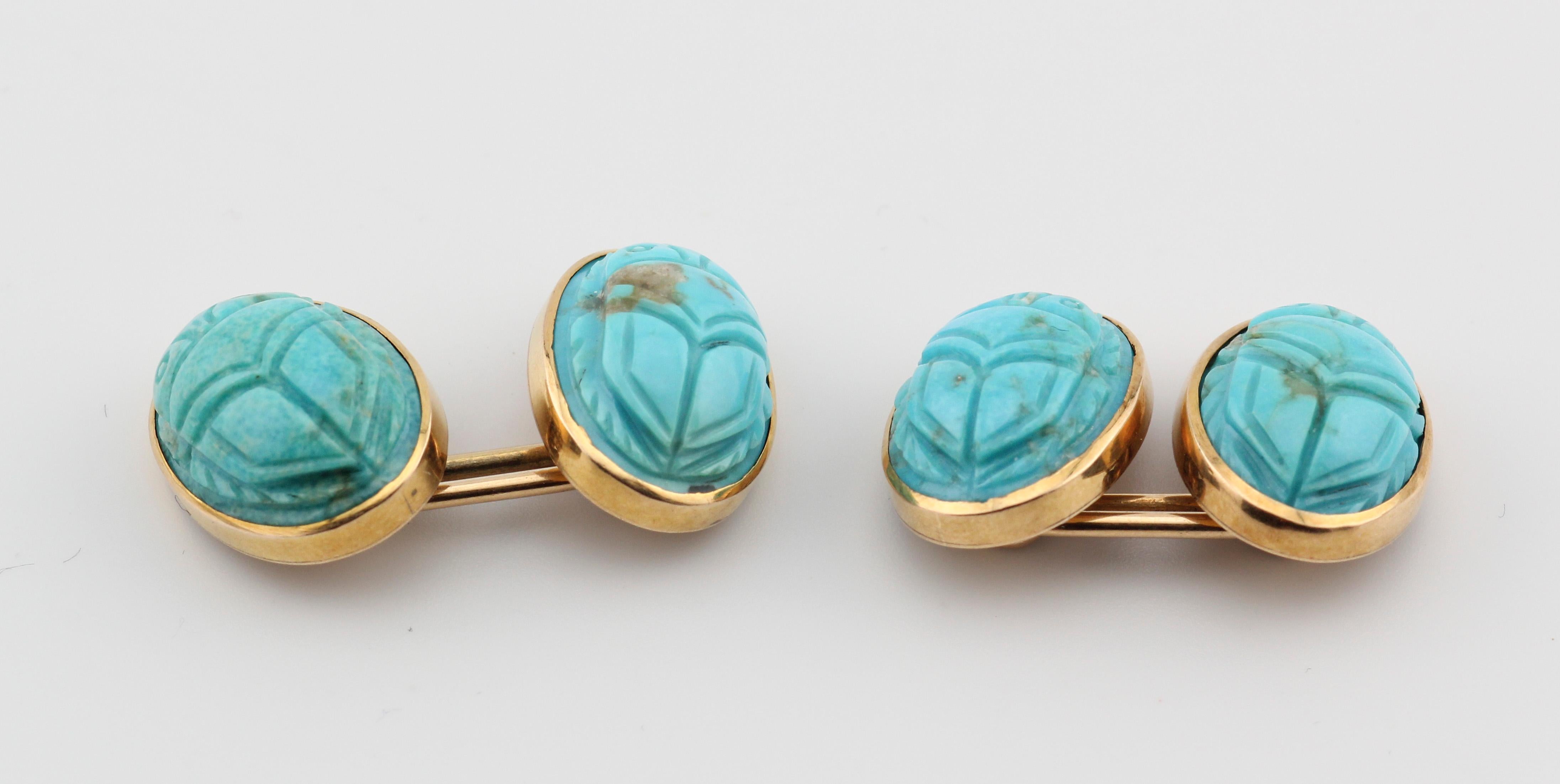 Unearth a Legacy of Style: Shreve & Co. Vintage Scarab Cufflinks with Turquoise in 14k Gold

Embrace timeless elegance with these captivating vintage Shreve & Co. scarab motif cufflinks.  Crafted from 14k yellow gold and adorned with carved