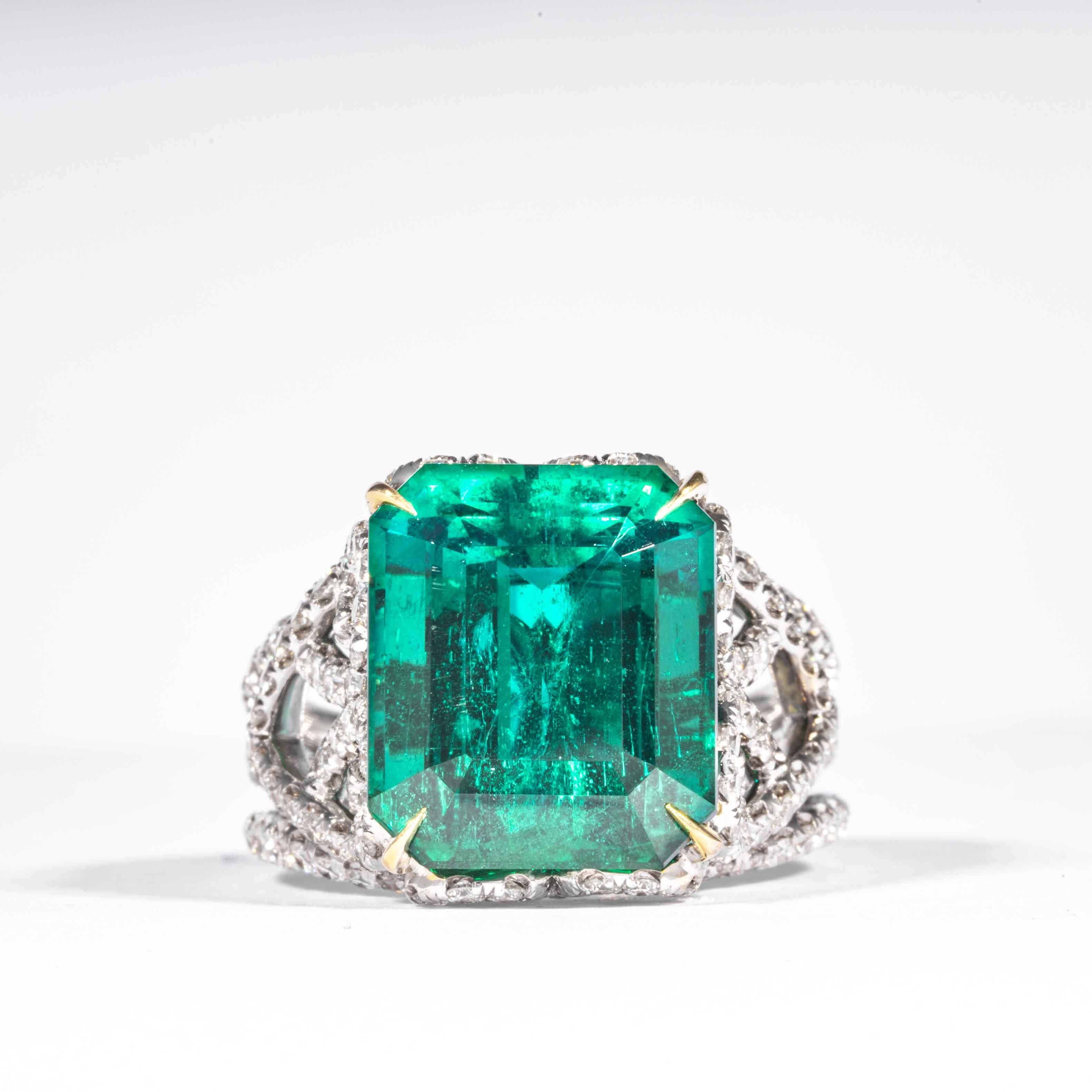 This unique emerald ring is offered by Shreve, Crump & Low. This green emerald cut emerald is custom set in a handcrafted Shreve, Crump & Low one-of-kind 18kt white gold and yellow gold ring, consisting of 1 dazzling green emerald cut emerald