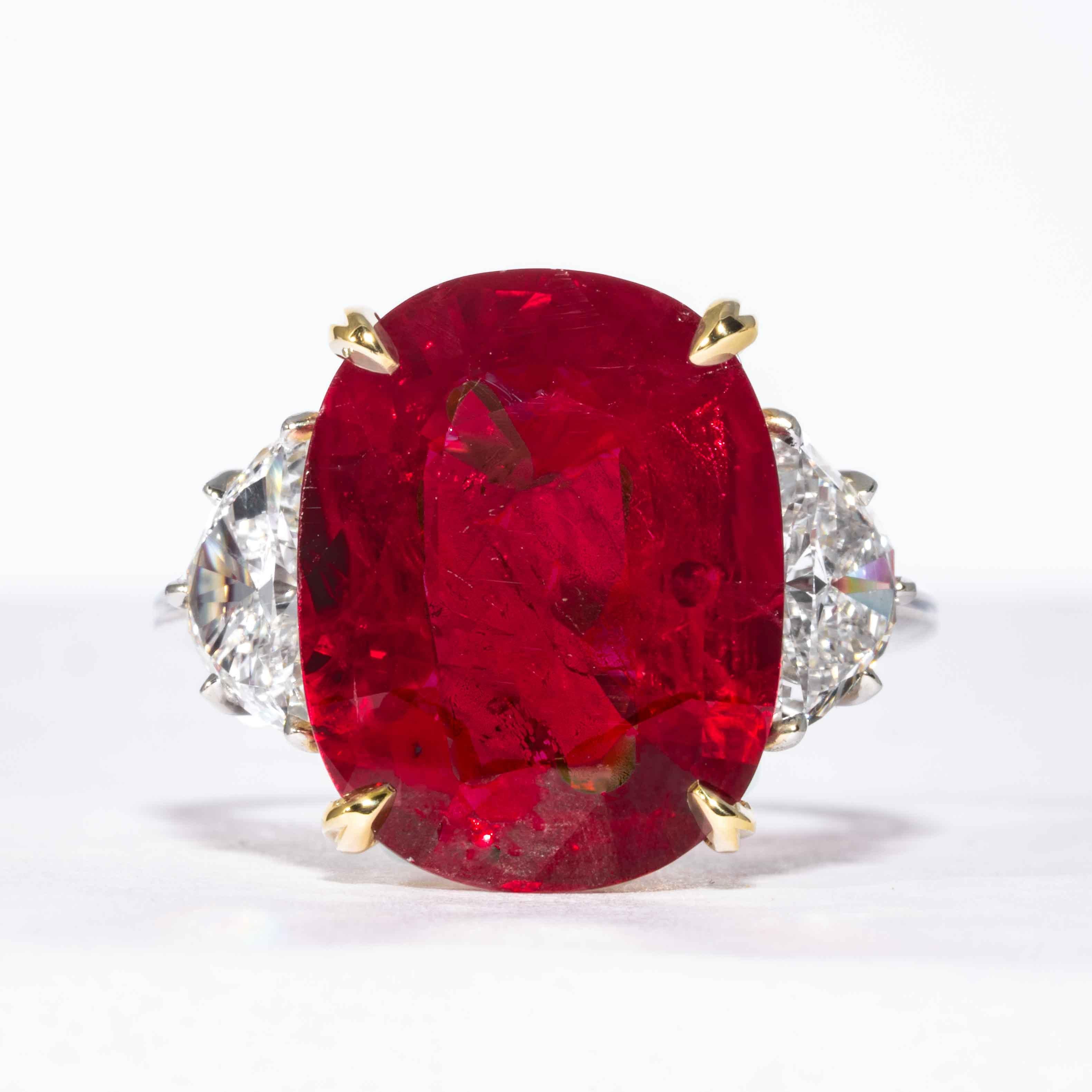 This ruby and diamond 3-stone ring is offered by Shreve, Crump & Low.  This 