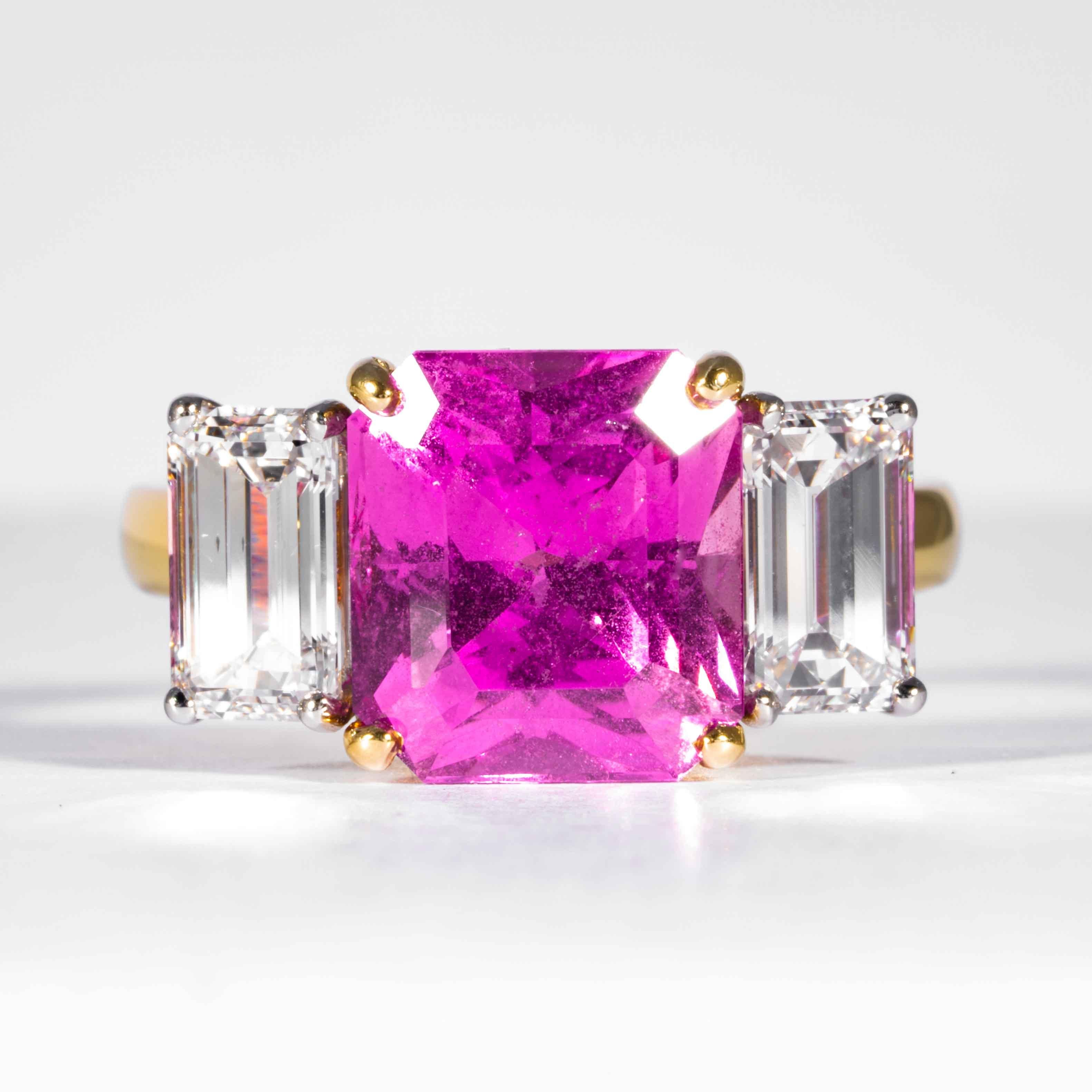 This sapphire and diamond 3-stone ring is offered by Shreve, Crump & Low. This radiant cut pink sapphire is custom set in a handcrafted Shreve, Crump & Low platinum and 18k yellow gold 3-stone ring, consisting of 1 vibrant radiant cut pink sapphire