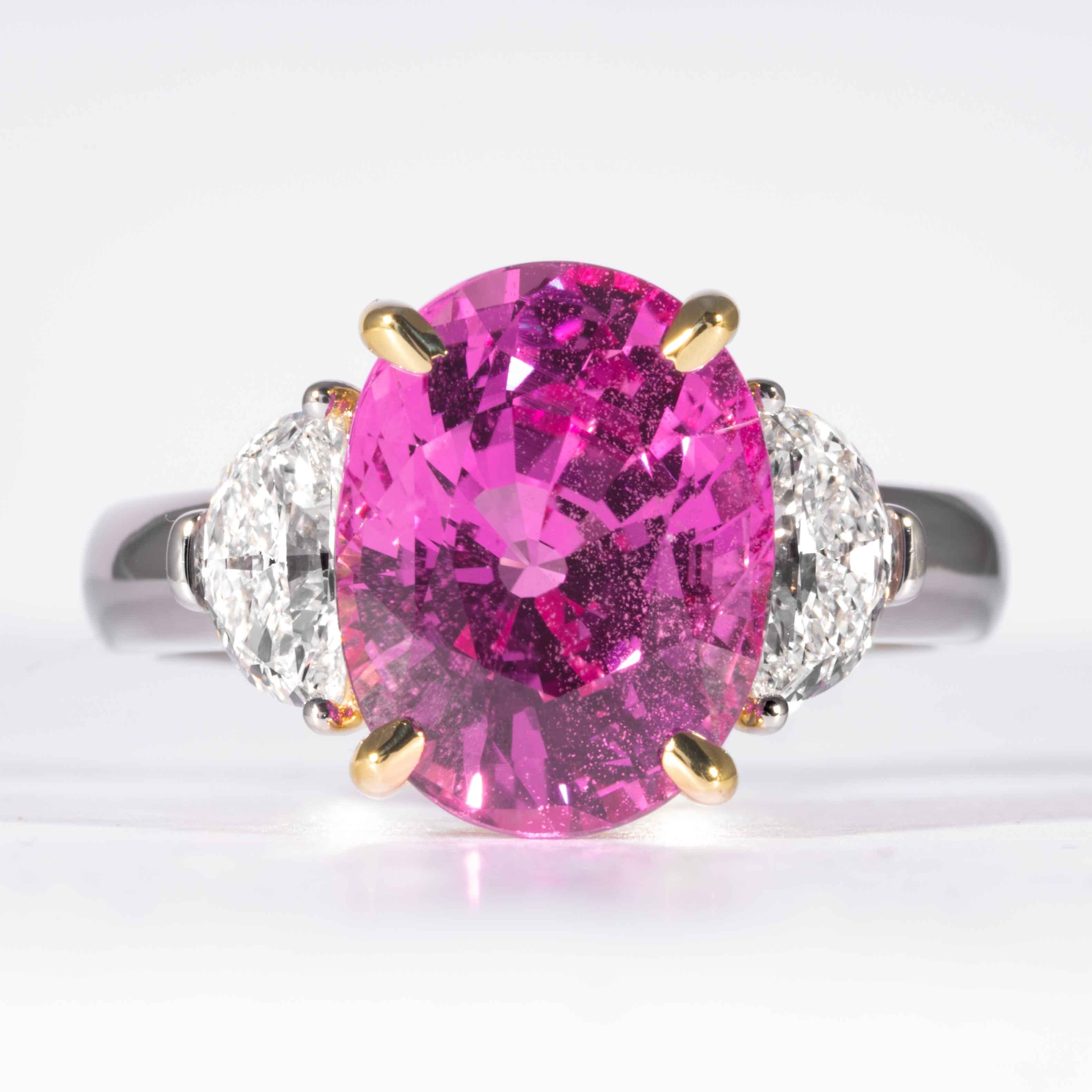 This sapphire and diamond 3-stone ring is offered by Shreve, Crump & Low. This oval cut pink sapphire is custom set in a handcrafted Shreve, Crump & Low platinum 3-stone ring, consisting of 1 pink sapphire oval cut sapphire weighing 6.22 carats. The