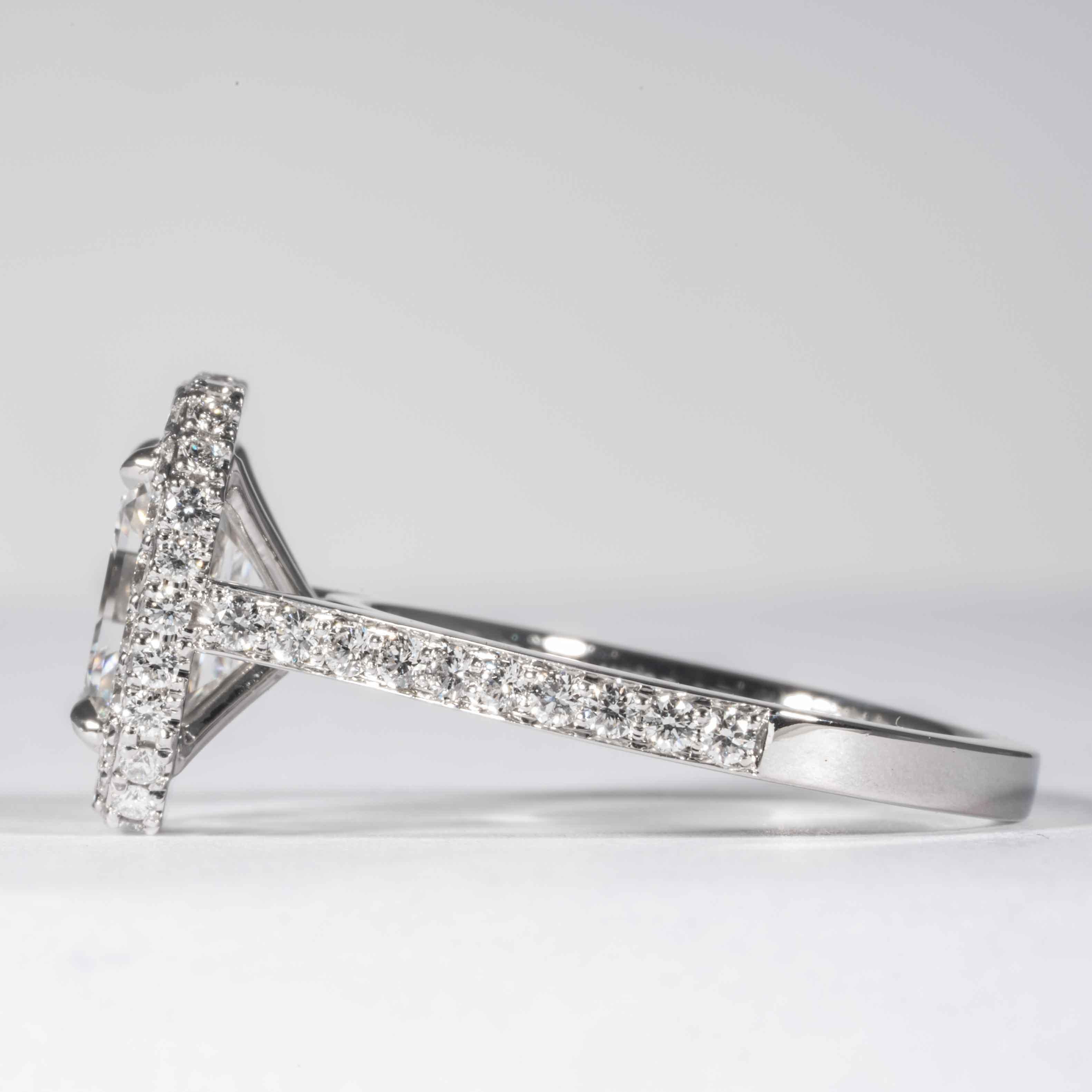 low set emerald cut diamond ring
