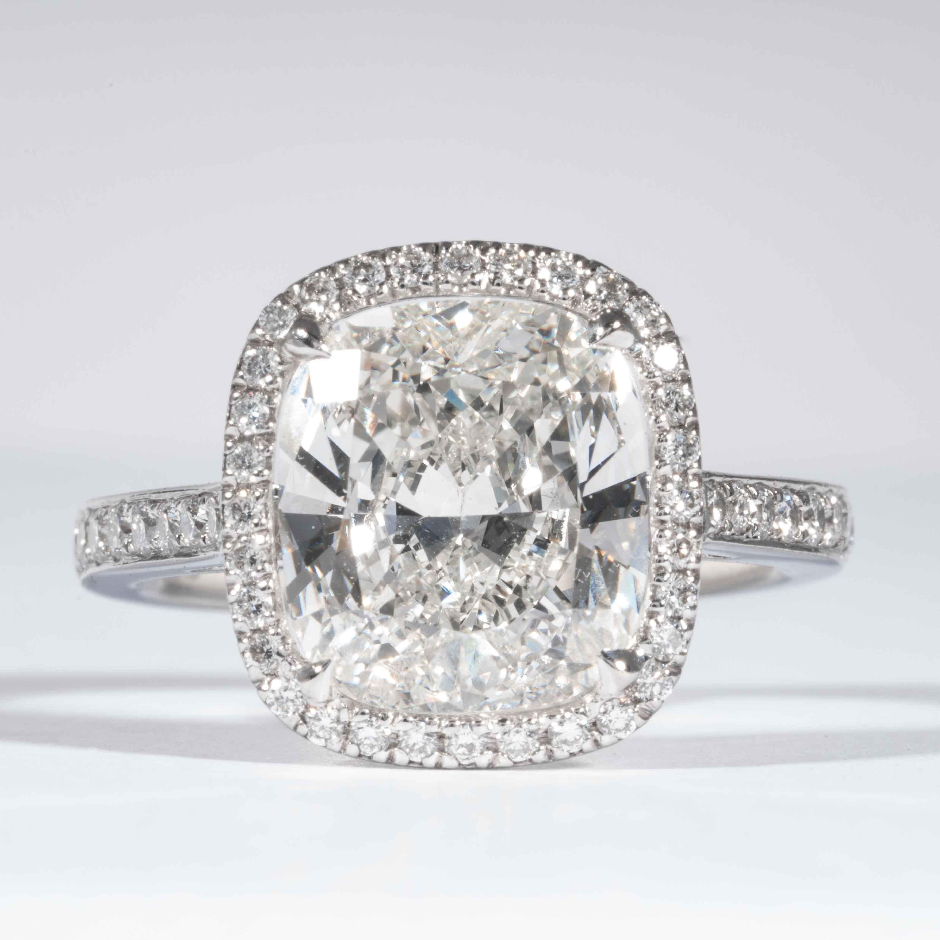 This diamond ring is offered by Shreve, Crump & Low. This 4.01 carat GIA Certified I VVS2 cushion cut diamond measuring 10.59 x 9.48 x 5.14 mm is custom set in a handcrafted Shreve, Crump & Low platinum ring. The 4.01 carat center diamond is