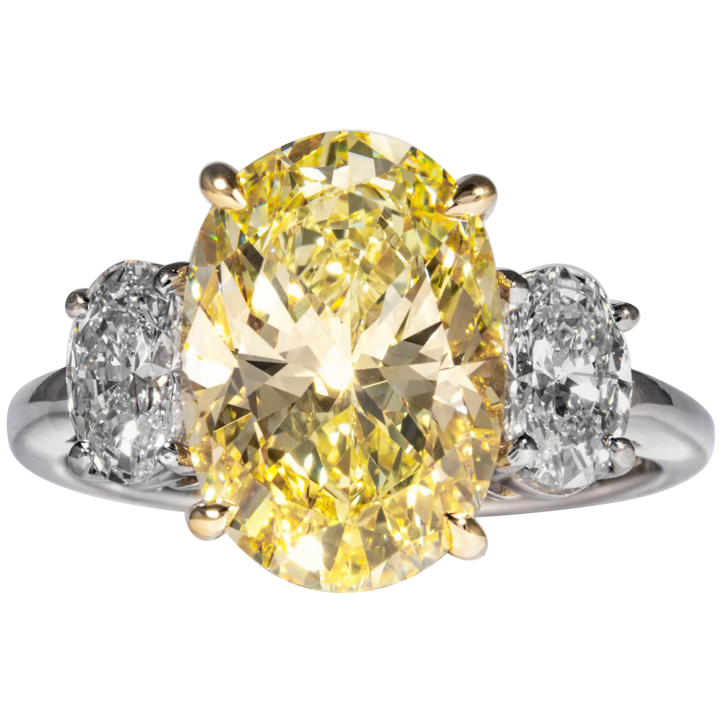 Shreve, Crump & Low GIA Certified 4.55 Carat Fancy Yellow Oval Diamond Ring