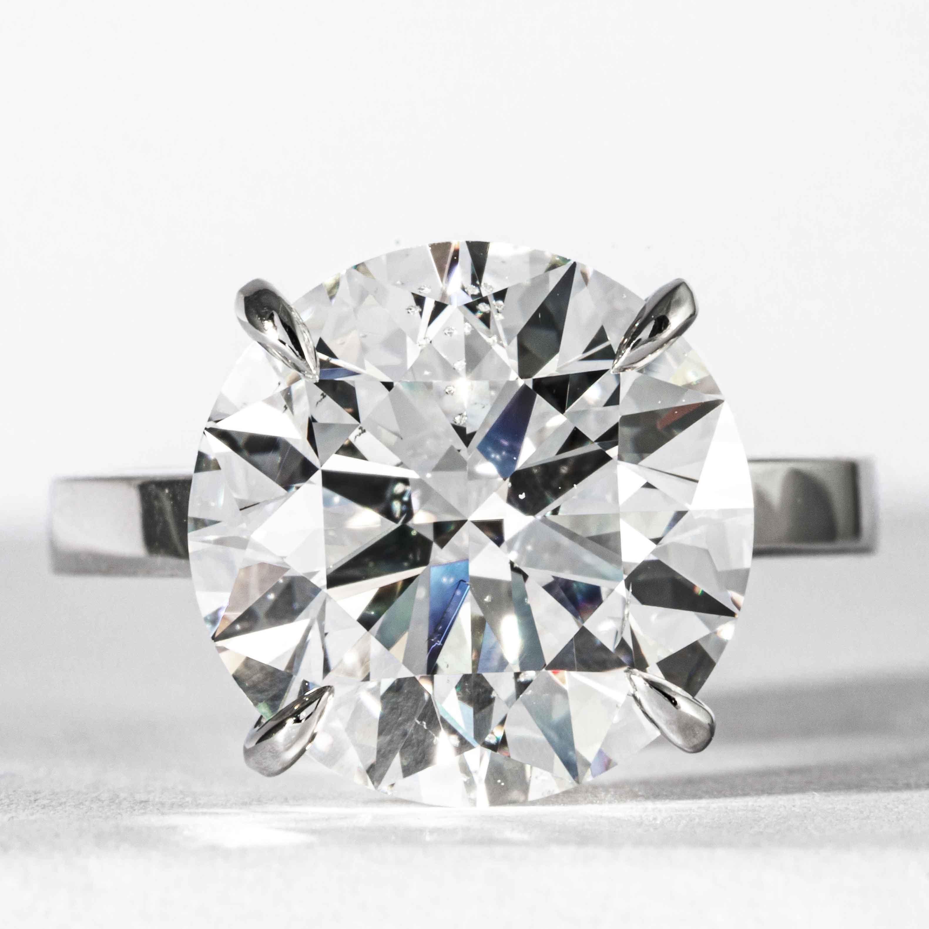 This diamond solitaire ring is offered by Shreve, Crump & Low. This 8.04 carat GIA certified F SI2 round brilliant cut diamond measuring 12.78 - 12.83 x 7.91mm is custom set in a handcrafted Shreve, Crump & Low platinum ring.  The 8,04 carat round