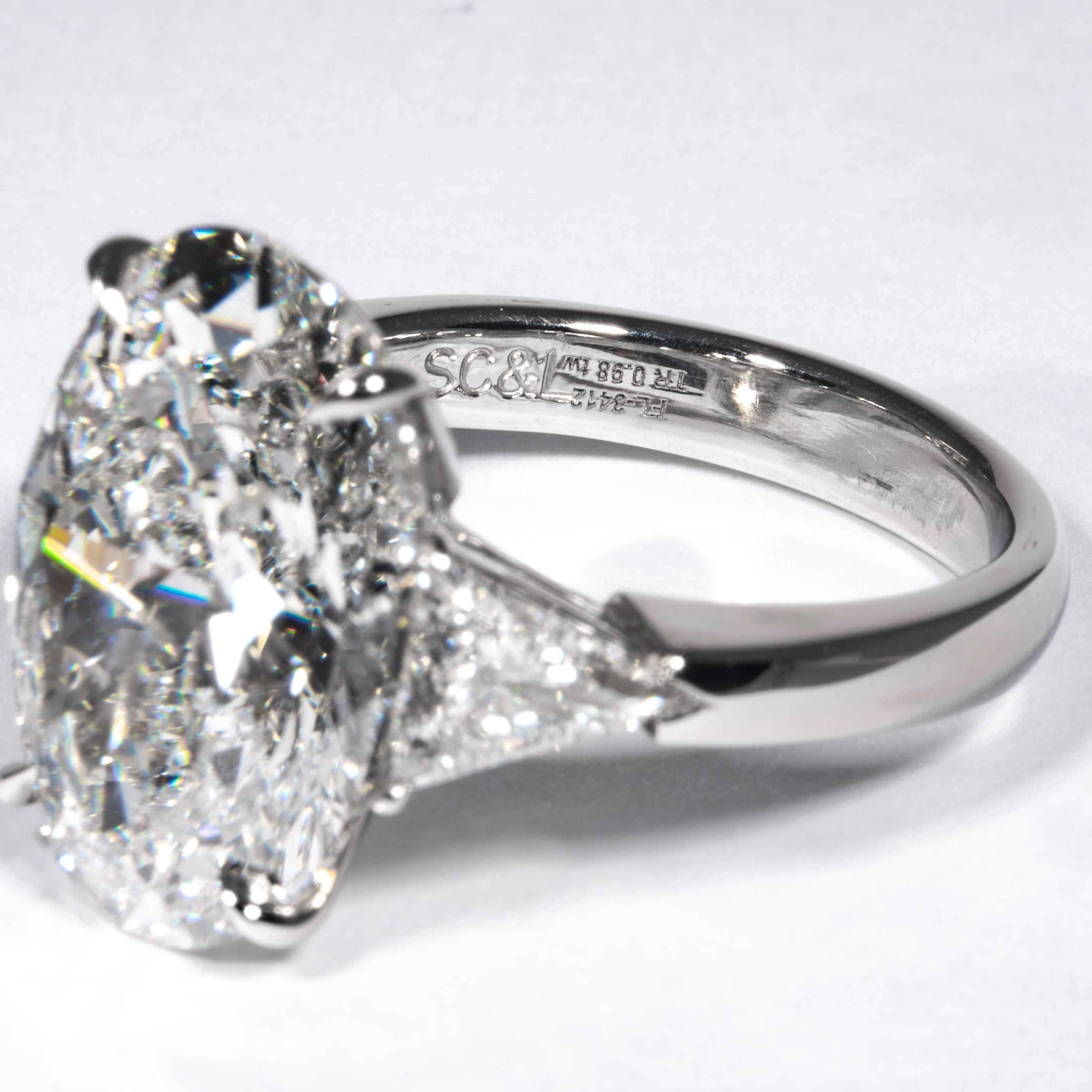 Shreve, Crump & Low GIA Certified 9.08 Carat F SI2 Oval Cut Diamond 3-Stone Ring In New Condition For Sale In Boston, MA