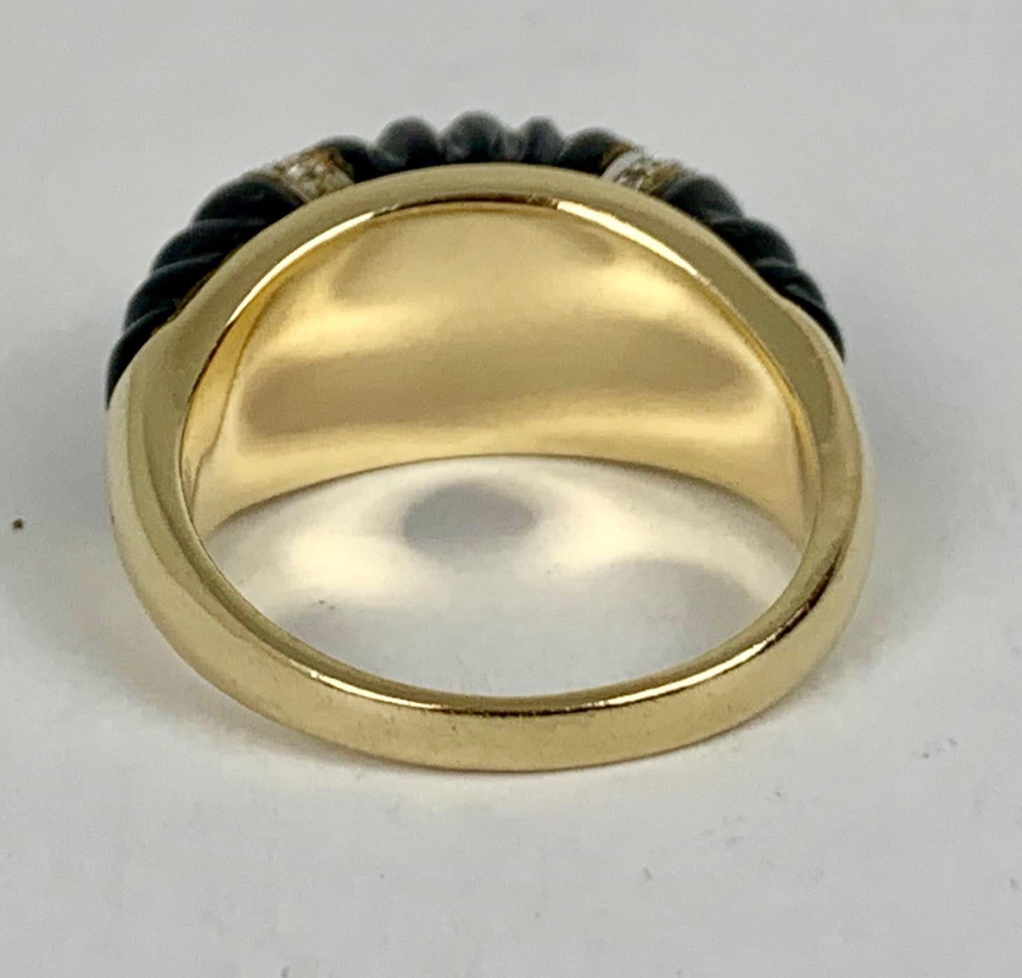 Art Deco   Shrimp Style Ring with Carved Onyx and Diamonds set in 14K Yellow Gold