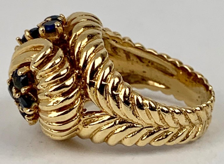 Shrimp Style Gold Ring with 10 Round Faceted Sapphires, 14 kt y.g. For