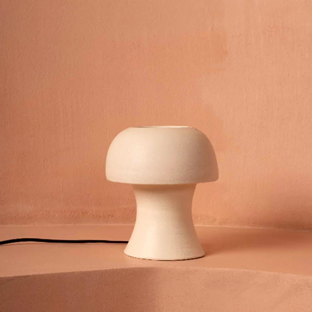 Shroom Clay Table Lamp by Harshita Jhamtani Designs
Dimensions: D 16.5 x H 17.8 cm
Materials: Stoneware clay.

Available in Egg White, Blush Pink, and Charcoal Black. Please contact us.

Shroom, as the name suggests is an inspiration drawn from a