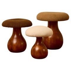 "Shrooms" stools in wood and bouclette fabric by Studio Glustin