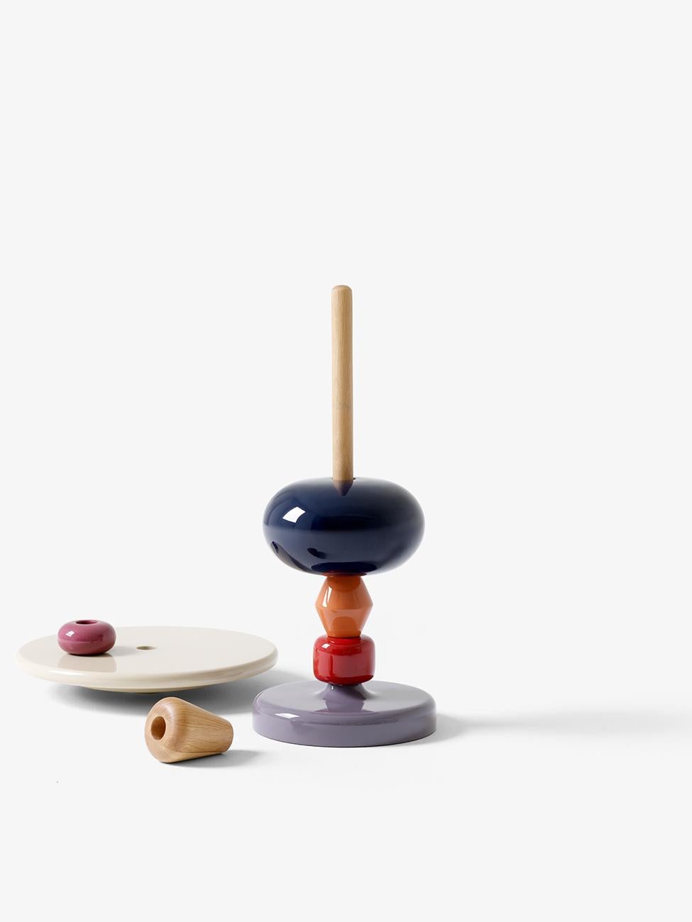 The shuffle side table in array colors seems to conjure images of classic wooden toys and with good reason. 
The choice of colors and the fact that you can unify and construct the table as you like are all ideas Mia Hamborg got from the Brio