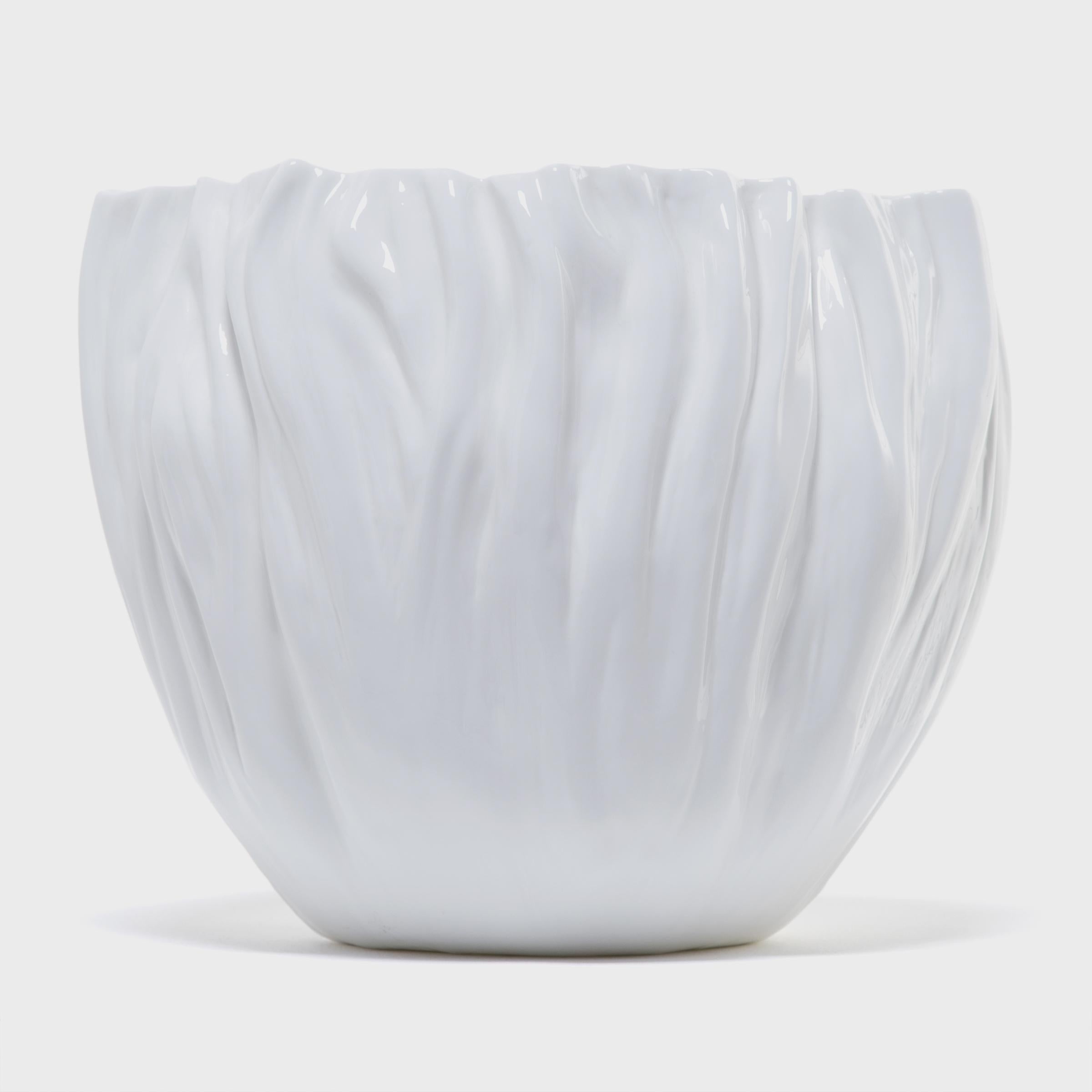 Tapping into a tradition of creating exceptionally fine porcelain that dates back to the 9th century A.D., Chinese artist Xie Dong has earned international acclaim for her captivating porcelain designs. Intrigued by all that is formless or ephemeral