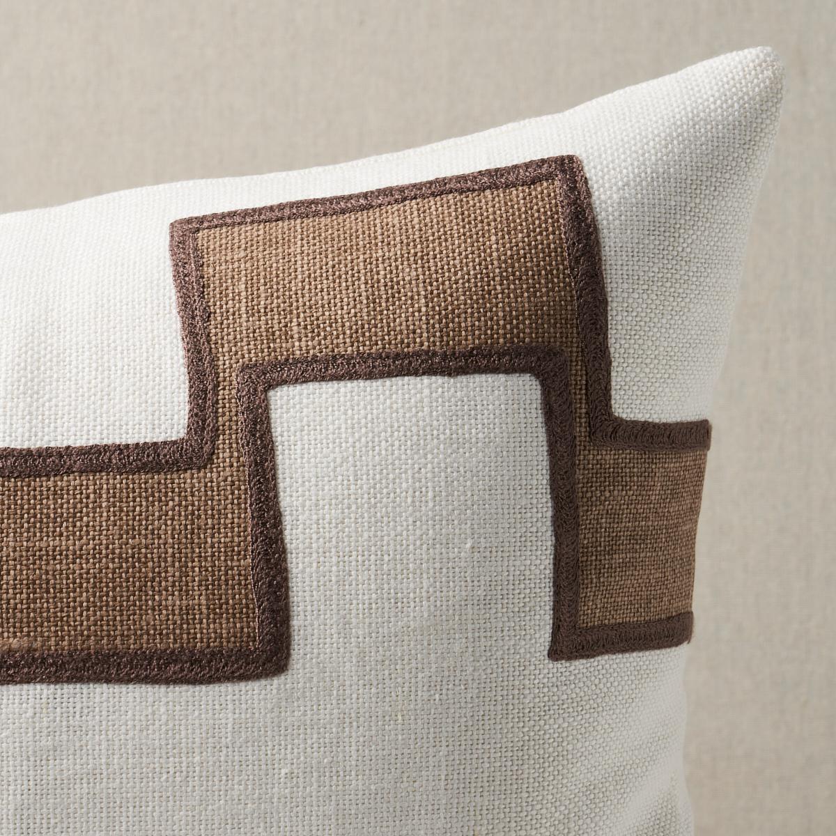 This pillow features Dixon Embroidered Print Linen with a knife edge finish. A series of stepped lines is handprinted with pigment ink on a linen ground and then embroidered along the edges to amp up the bold and graphic impact of this large-scale