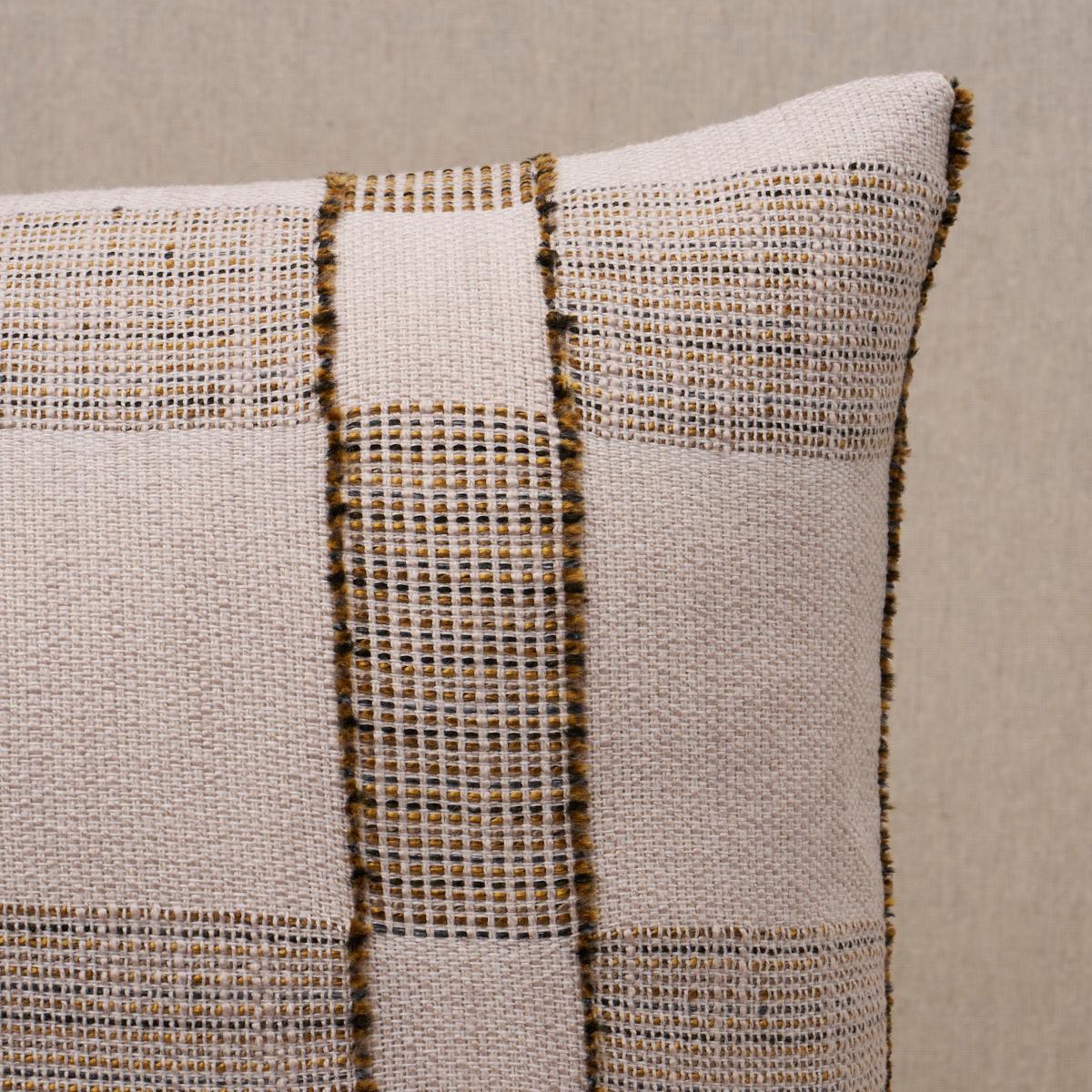 This pillow features Elko Plaid with a knife edge finish. The asymmetrical design and unexpected fringe detailing shows the hand of the maker in this plaid. Pillow includes a feather/down fill insert and hidden zipper closure.
