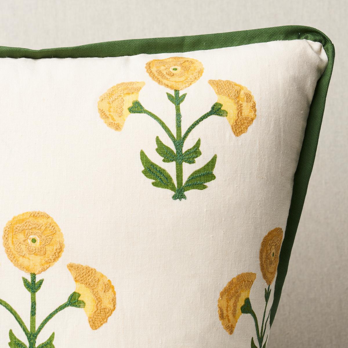 This pillow features Saranda Flower and is finished with a flange in Elliott Brushed Cotton. Inspired by traditional Indian hand-block designs, this marigold-colored Saranda Flower Embroidery features stylized flowers handprinted on a linen-ground