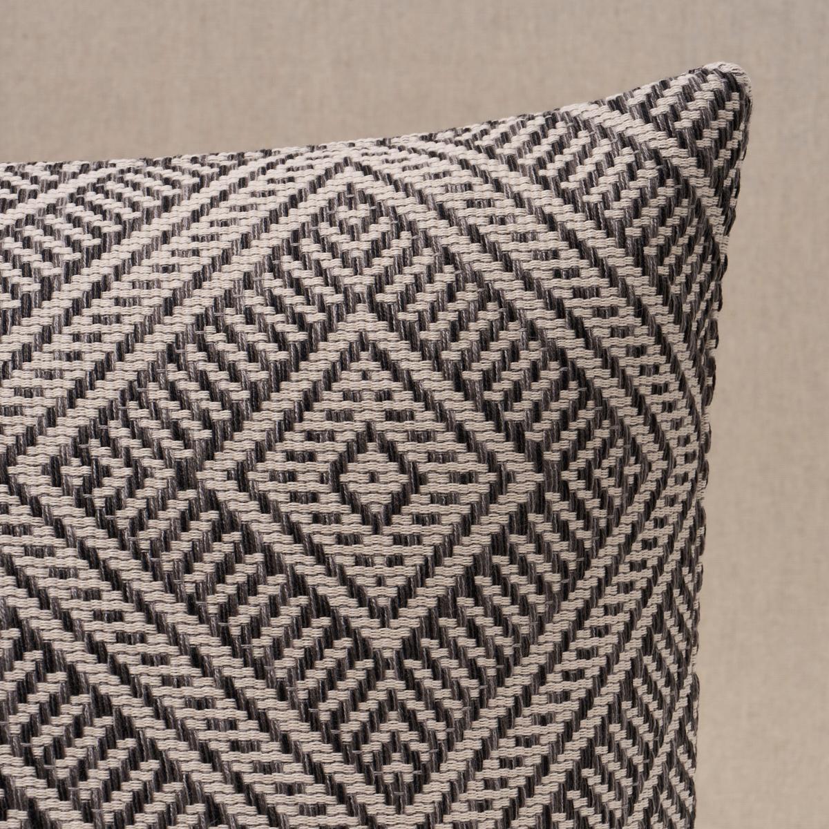 This pillow features Tortola with a knife edge finish. Inspired by basket designs, this concentric diamond pattern is woven from Dralon acrylic yarns. Textured and extremely durable, it is suitable for both indoor or outdoor settings. Pillow