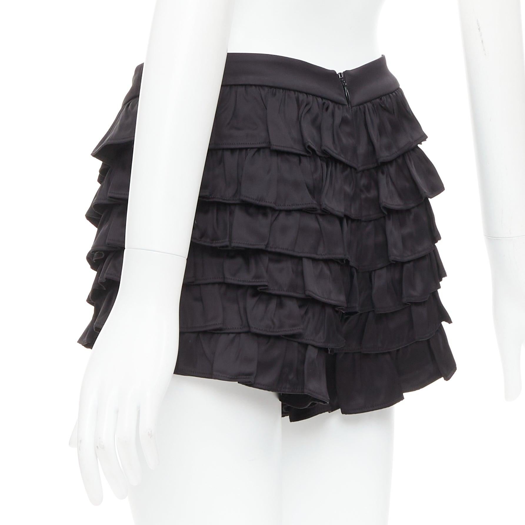 SHUSHU TONG mini shorts de viscosa negra con volantes y lazo de cristal UK6 XS en venta 1