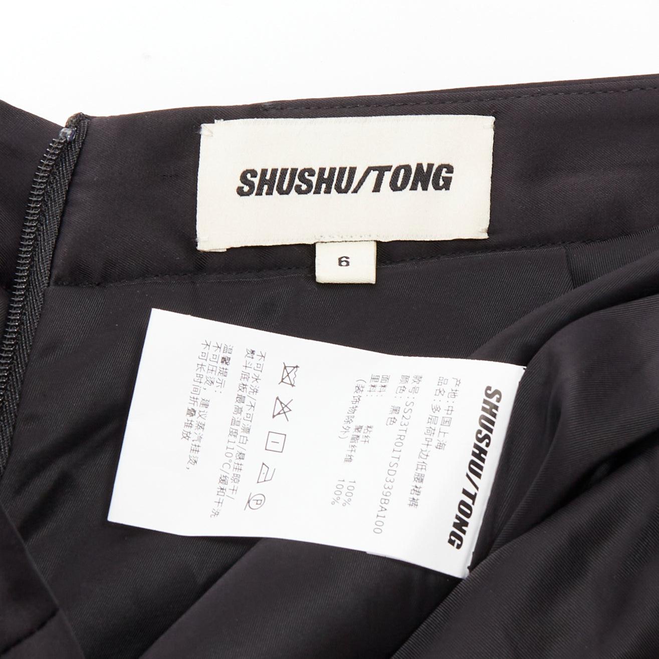 SHUSHU TONG mini shorts de viscosa negra con volantes y lazo de cristal UK6 XS en venta 3