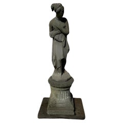 Shy Venus classical sculpture with pedestal