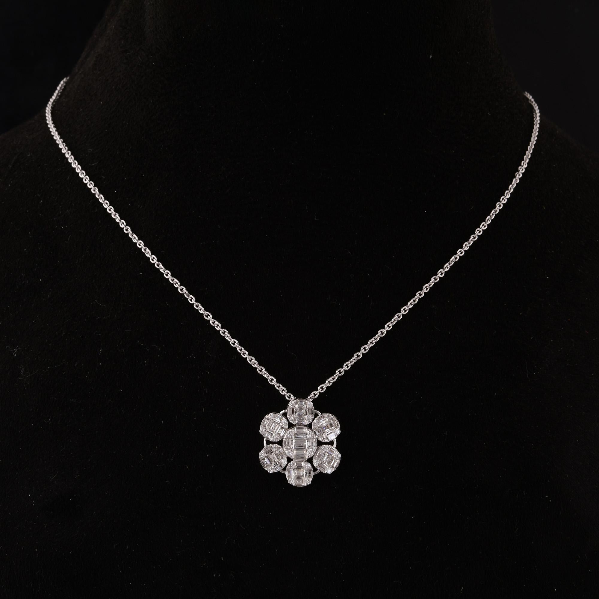 This exquisite pendant necklace features a stunning arrangement of baguette diamonds set in 14 karat white gold, creating a captivating flower design. Each diamond is meticulously selected for its quality, boasting SI clarity and HI color, ensuring