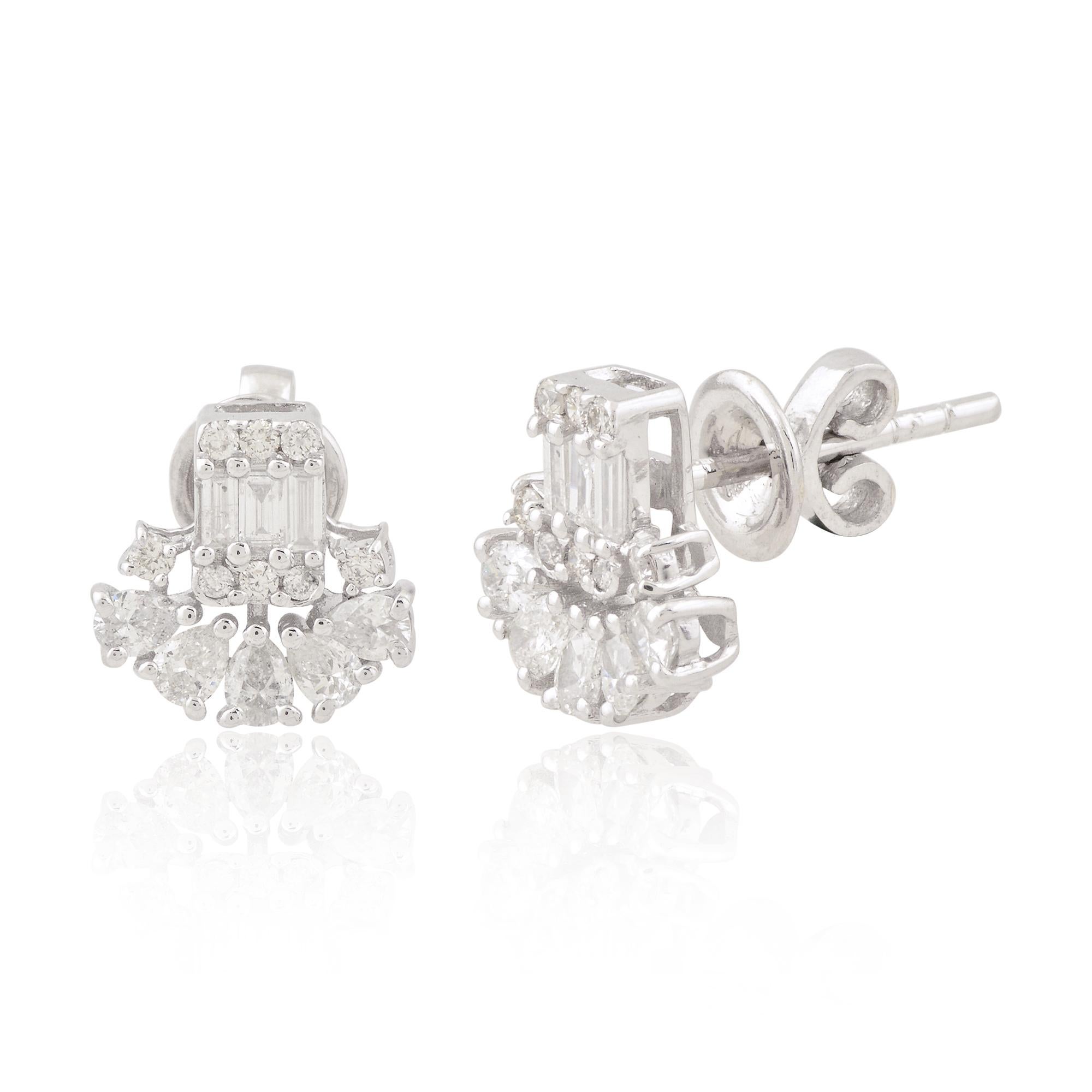 Each stud earring features a mesmerizing baguette-cut diamond, renowned for its sleek silhouette and captivating sparkle. Selected for their superior quality, these diamonds boast a clarity grade of SI (Slightly Included) and a color grade of HI