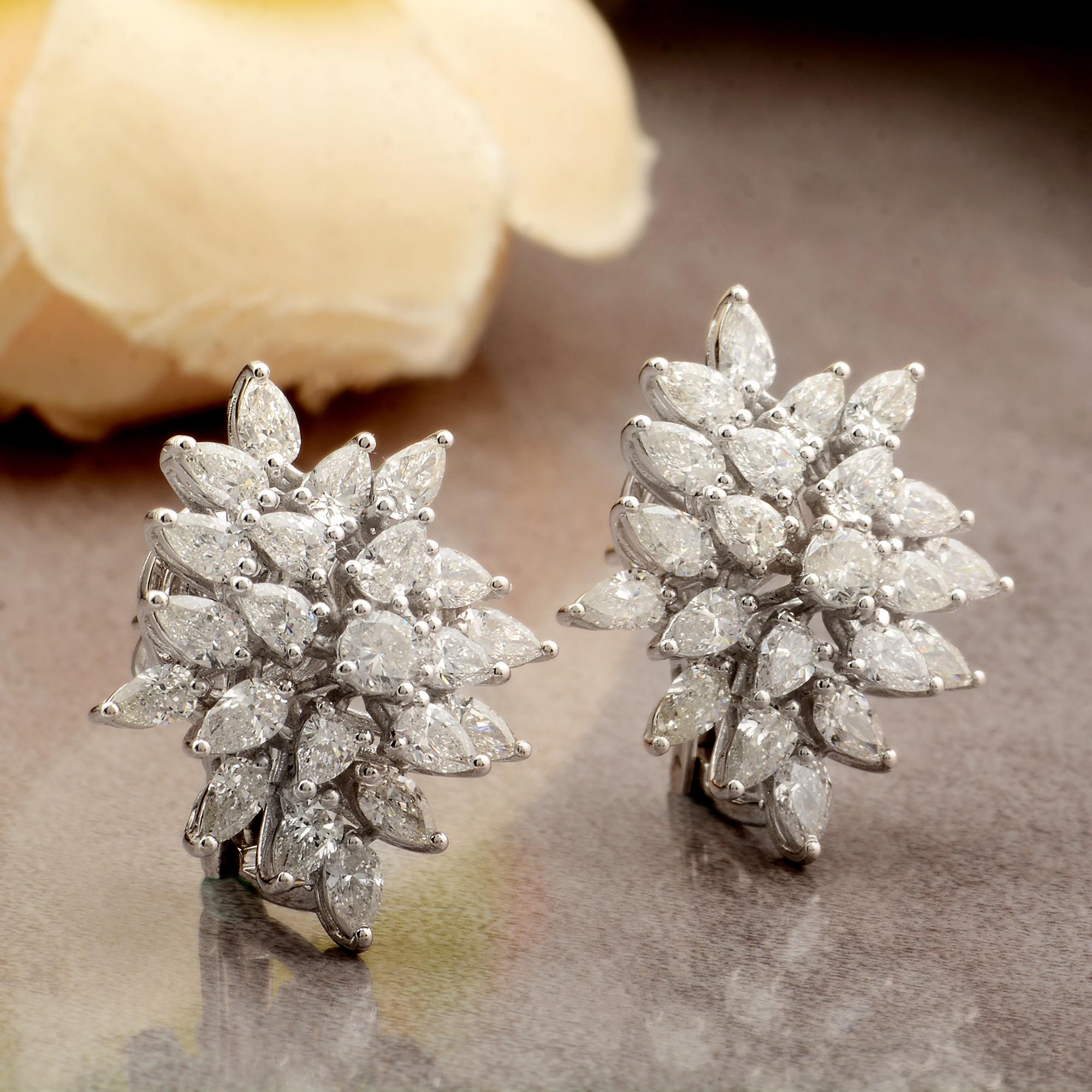 Cast from 14-karat gold, these exquisite earrings are handset with 3.90 carats of sparkling diamonds.

FOLLOW SPECTRUM JEWELS storefront to view the latest collection & exclusive pieces. Spectrum Jewels is proudly rated as a Top Seller on 1stdibs