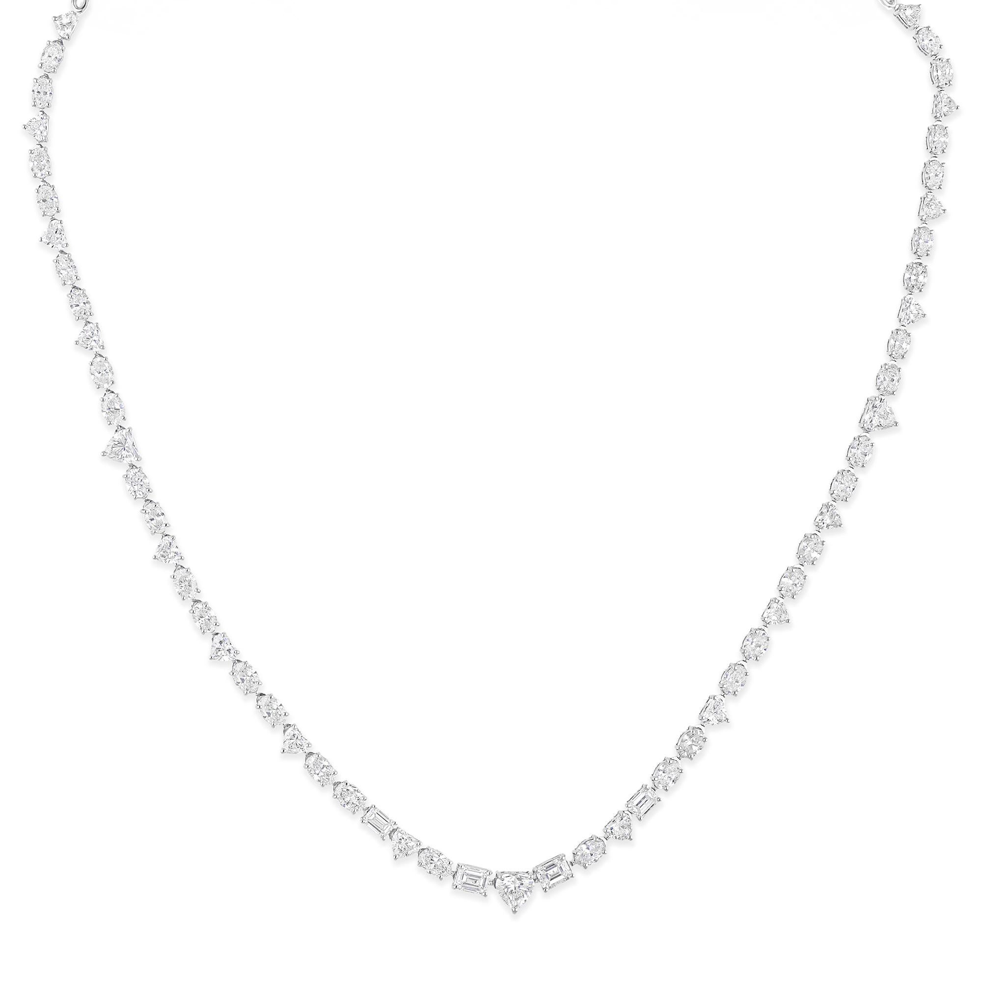 This stunning necklace showcases 11.65 carats of multi-shaped diamonds, meticulously arranged to create a captivating display of brilliance. Crafted in 18 karat white gold, the necklace weighs a total of 15.82 grams, with 13.49 grams of white gold.