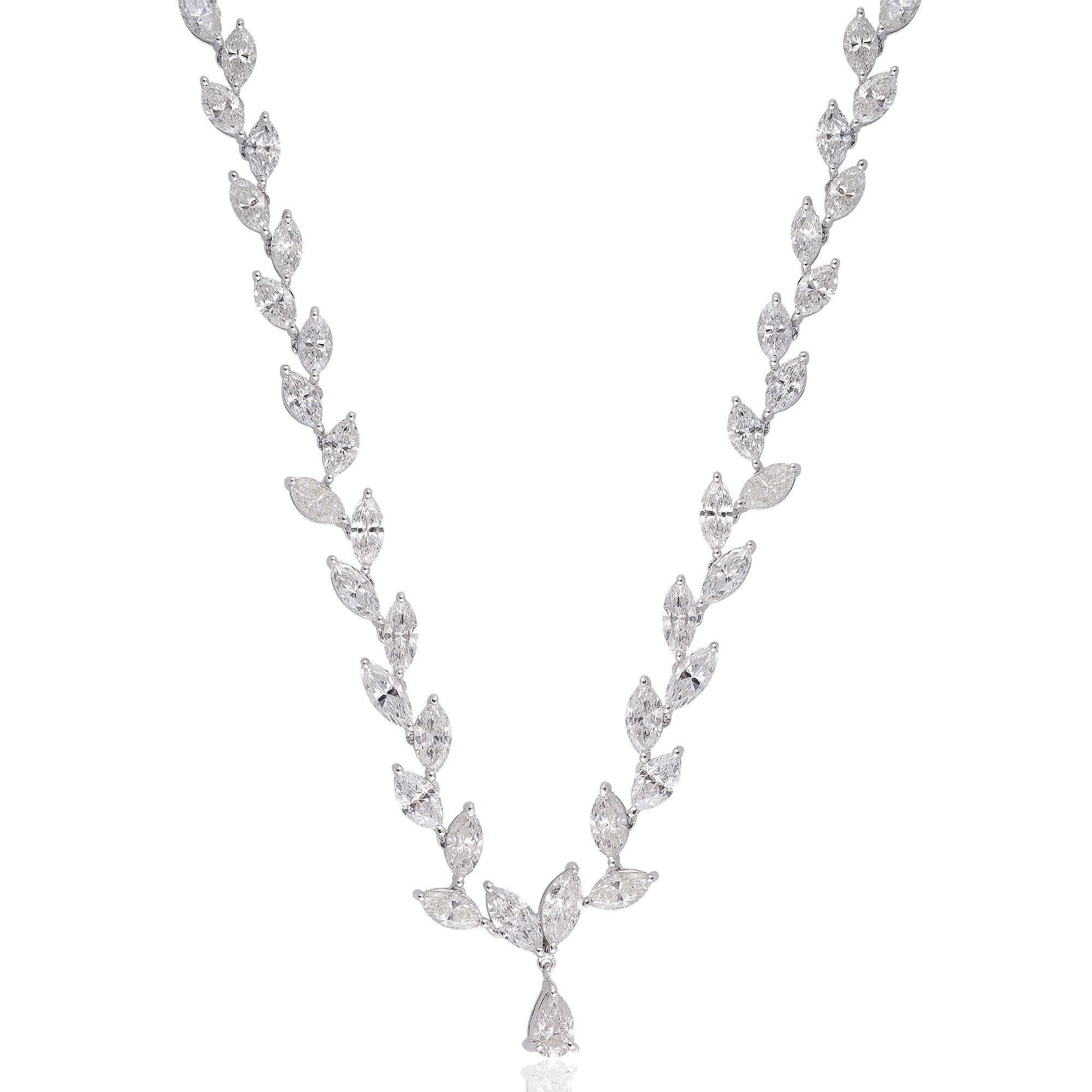 Introducing our exquisite pear and marquise diamond necklace, a stunning piece of fine jewelry meticulously crafted in 14 karat white gold. This necklace showcases the captivating beauty and brilliance of pear and marquise-cut diamonds in an elegant