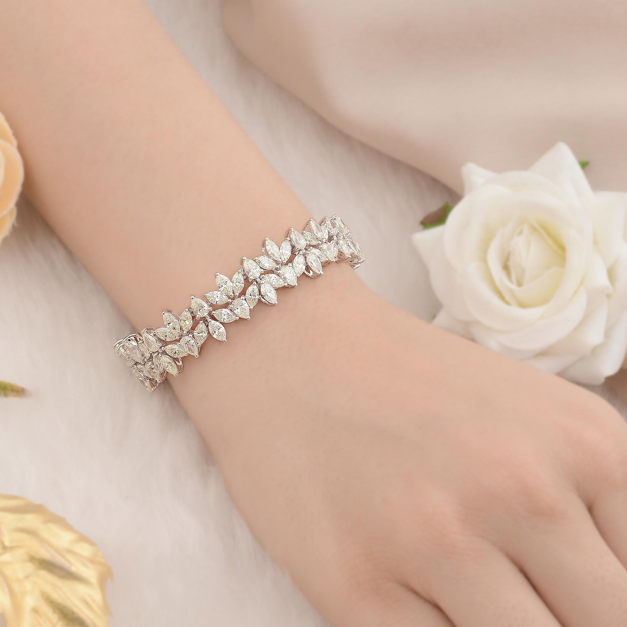 Bracelet tennis en or blanc 14 carats avec diamants taille poire marquise SI Clarity HI Couleur
Le bracelet de déclaration présente des diamants taille poire et marquise en grappe, ce qui en fait un bracelet de mariage épais au design audacieux et